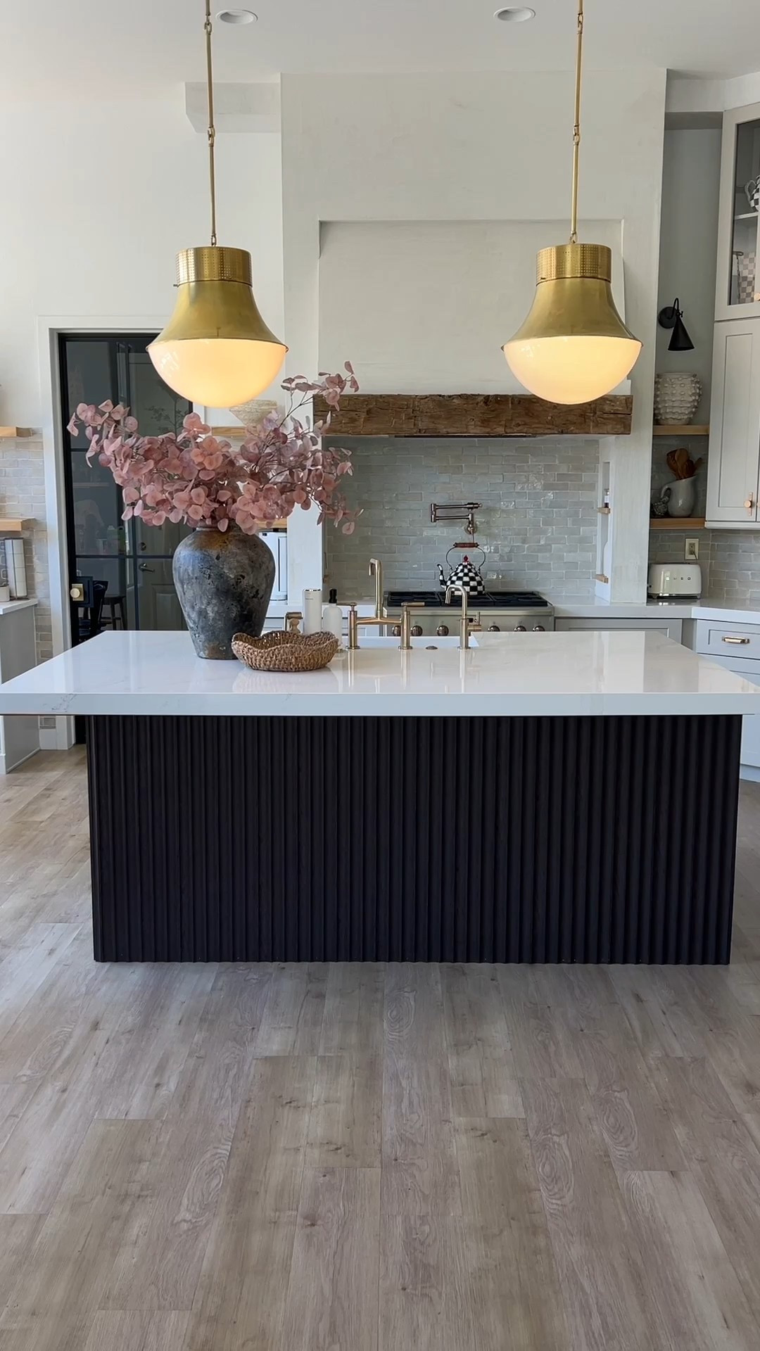 DIY Hack! Small change big impact! Adding these fluted panels to my island has truly elevated the look of my kitchen and the subtle change I needed🤍 Also love that it's a budget friendly alternative to having to replace my island as well! Comes in different finishes & style. 



#LTKHome