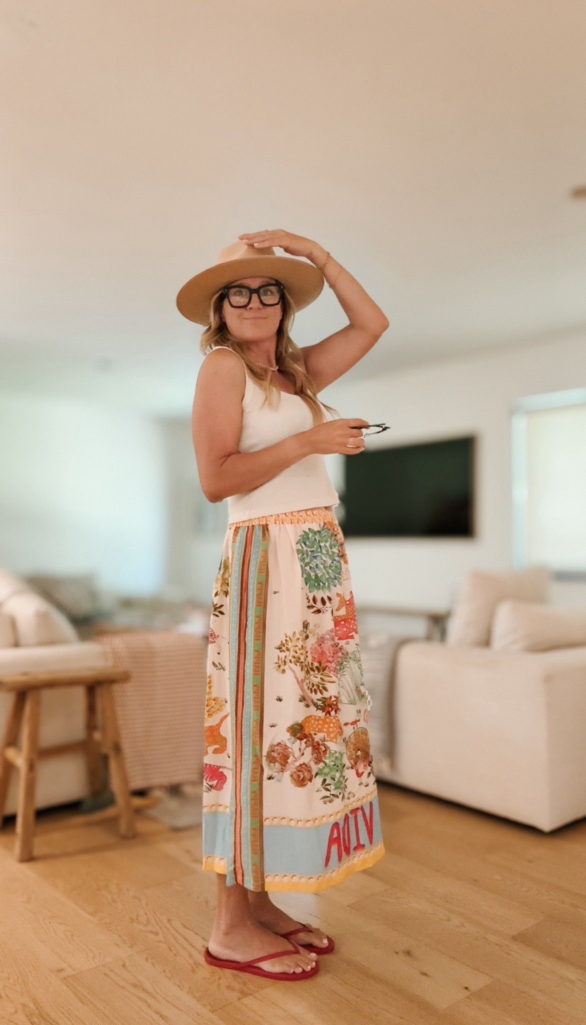 Easy, breezy, vacation-to-backyard outfit energy ☀️ Wearing my colorful silk print midi skirt (elastic waist + lightweight fabric = all-day comfort) with a classic white tank, wide brim hat, and flip flops for the easiest summer style. This printed midi is perfect for travel, resort wear, or just making errands feel cute. Linking the exact skirt + similar styles in case you’re as obsessed as I am. 🌸 #floralmidi #vacationoutfit #summerstyle #LTKsummer #midiskirtoutfit #resortwear #floralprintskirt #summerootd

#LTKStyleTip