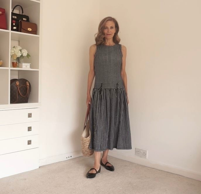 Drop waist dress with Mary Jane’s and a raffia bag.