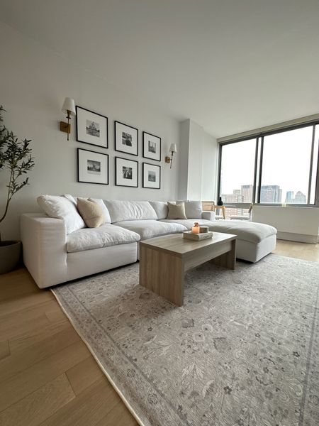 My neutral apartment living room decor! #neutralhome #neutraldecor #homedecor #cloudcouch #apartmenttour  

#LTKsalealert #LTKhome #LTKfindsunder100