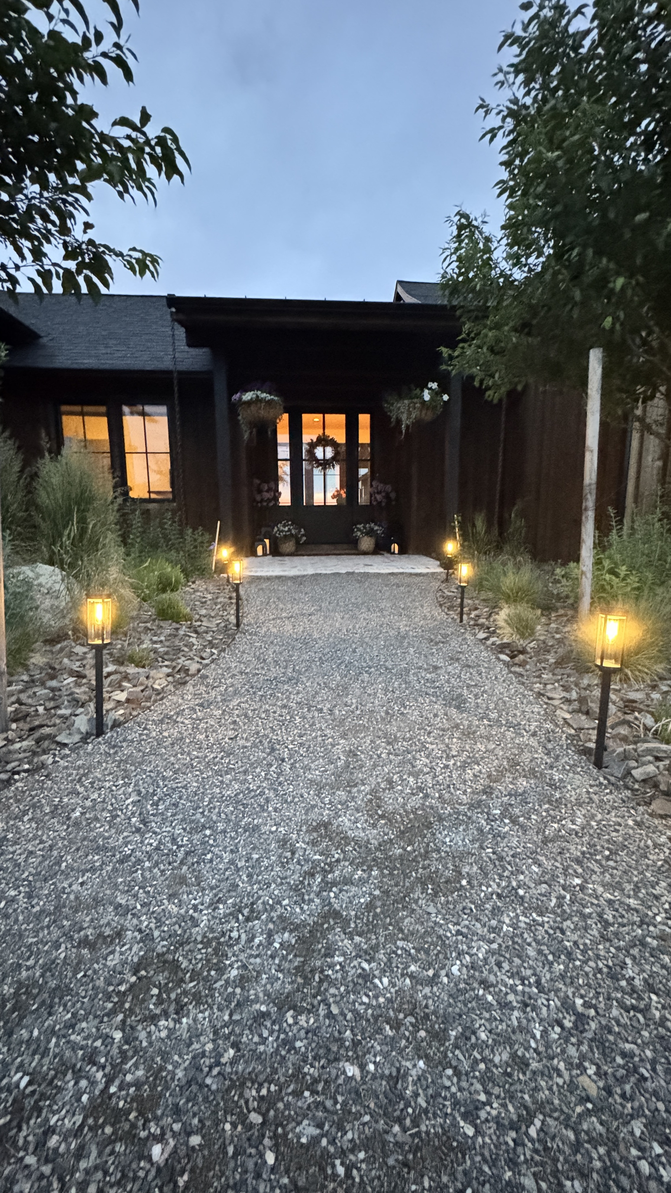 This might be my favorite view of our home lately. The solar lights lining the entry are simple but make such a statement. They charge during the day and glow all night—no flipping switches or worrying about timers.
Follow my shop @rushtonhome on the @shop.LTK app to shop this post and get my exclusive app-only content! Don’t forget to turn on post notifications using the 🔔 to get first dibs! Follow @rushtonhome on Instagram and Pinterest for more home decor inspiration and affordable home finds! Are you looking for anything home related? You’re in the right place! At Rushton Home, I do: home decor, living room, bedroom, affordable, walmart, target, amazon, wayfair, new arrivals, winter decor, spring decor, fall decor, fall finds, summer decor, home decor refresh, studio mcgee x target, hearth and hand, magnolia, holiday decor, seasonal decor, dining room decor, bedroom decor, living room decor, affordable home decor, furniture, weekend deals, sale, on sale, pottery barn, kirklands, west elm, bench, foyer table, faux florals, rugs, couches, sofa, sectional, dresser, nightstand, night stand, end tables, lamps, art, wall art, etsy, pillows, blanket, interior design, interior styling, bedding, side tables, bed frame, tray, side table, throw pillows, look for less, designer dupe, budget decor, bar stools, counter stools, vase, ceramic pottery, budget, budget friendly, coffee table, dining chairs, cane, rattan, wood, white wash, rustic amazon home, arch, brass hardware, gold hardware, vintage, antique, european inspired, french country, back in stock, #amazonfinds @amazon @amazonhome #founditonamazon


#LTKFindsUnder100 #LTKHome #LTKSaleAlert