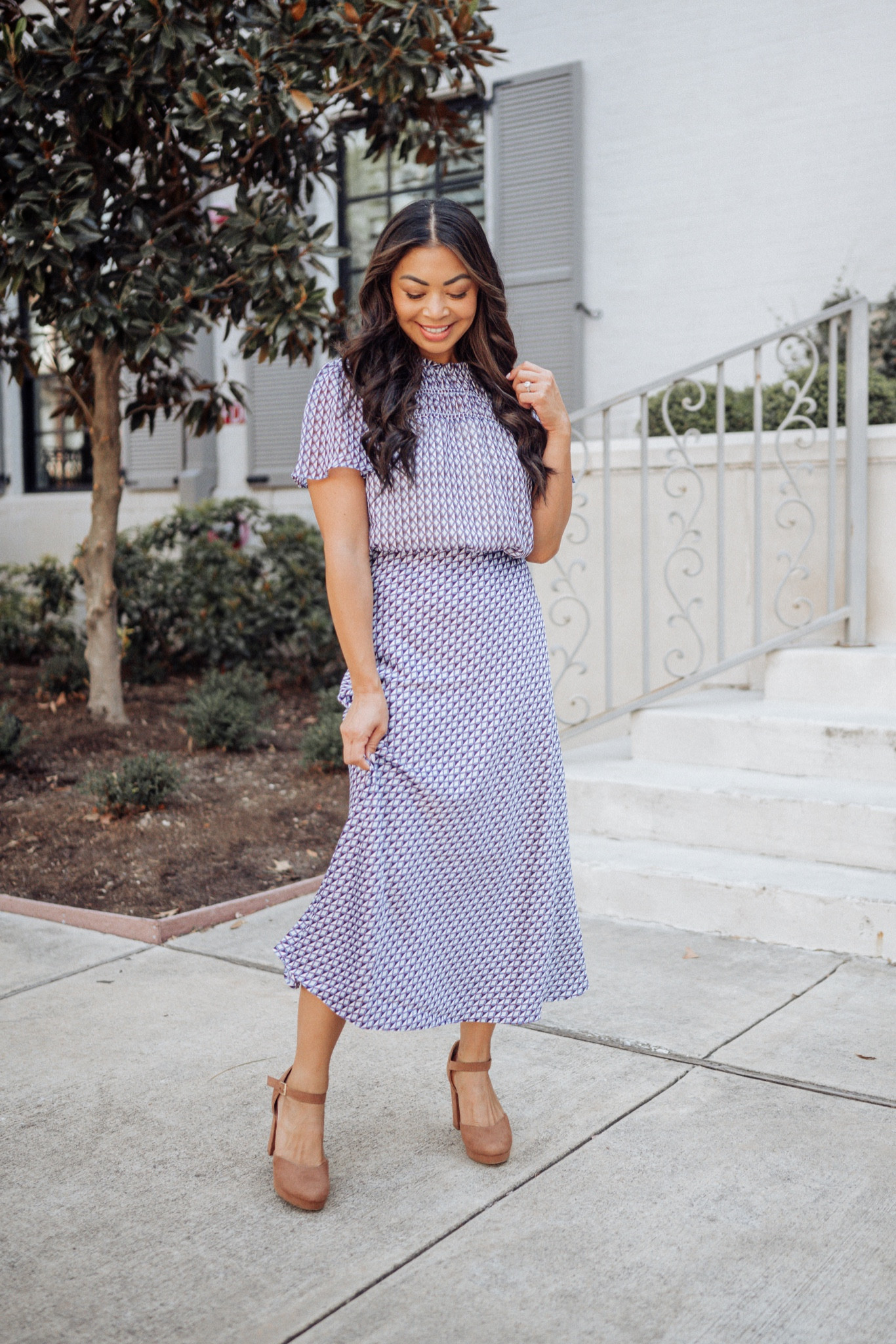 This geo print blouse and midi skirt make the perfect outfit for work! 