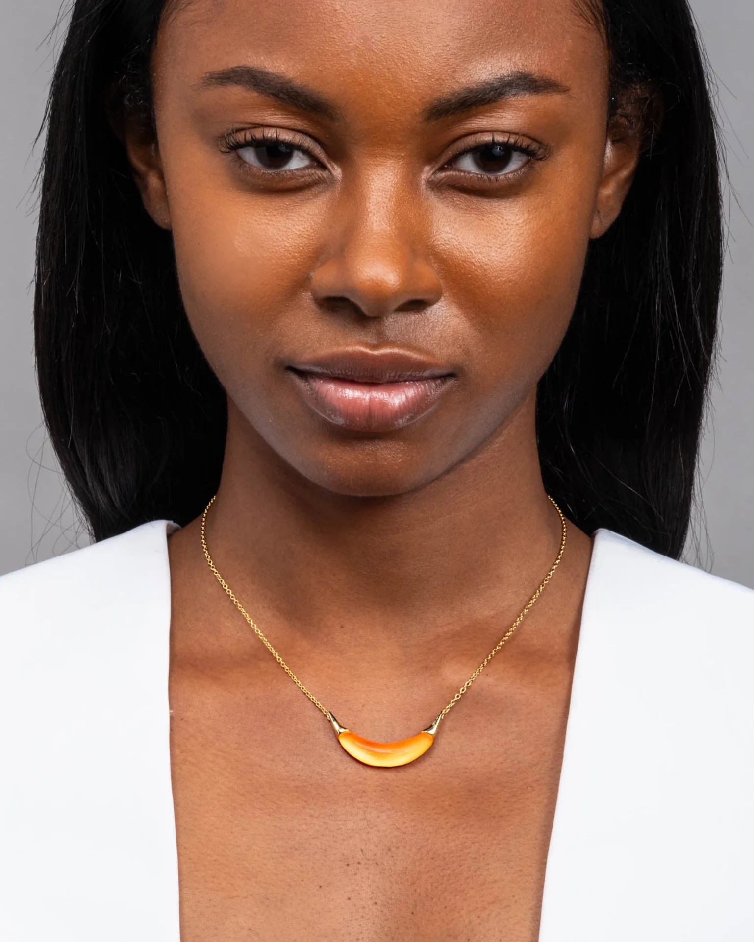 Neon Orange Crescent Lucite Necklace | Orange Crescent Pendant Necklace | Alexis Bittar