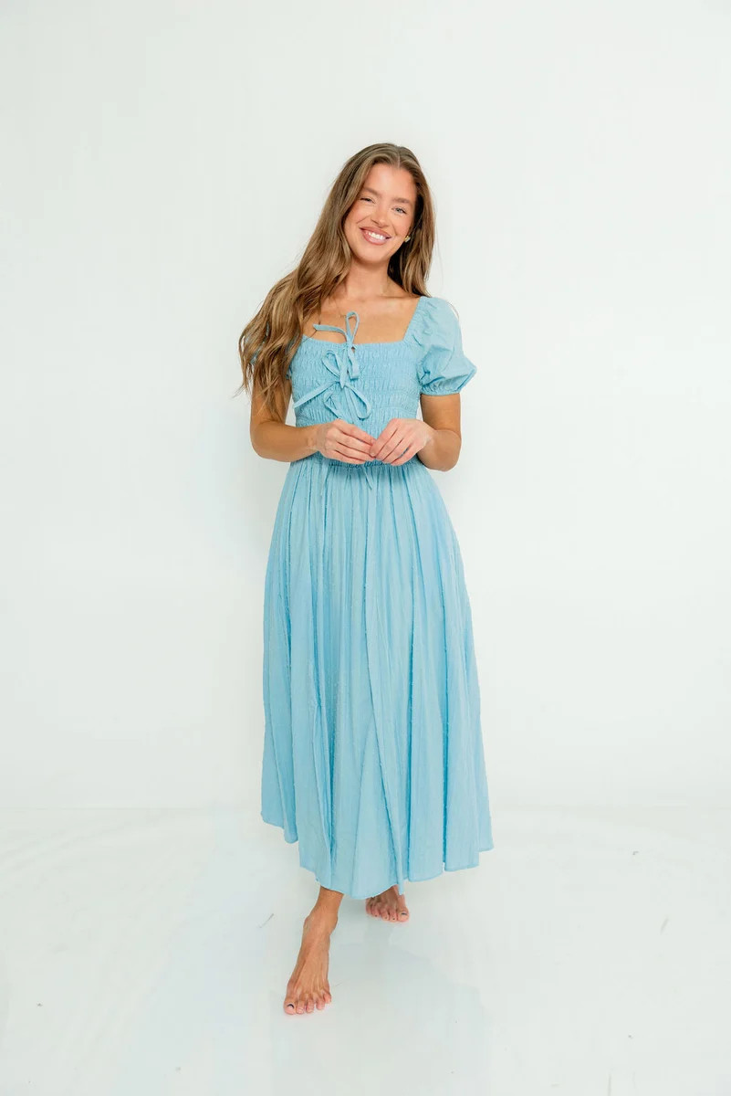 Arabelle Smocked Bow Detail Maxi Dress in Blue Aura | Worth Collective