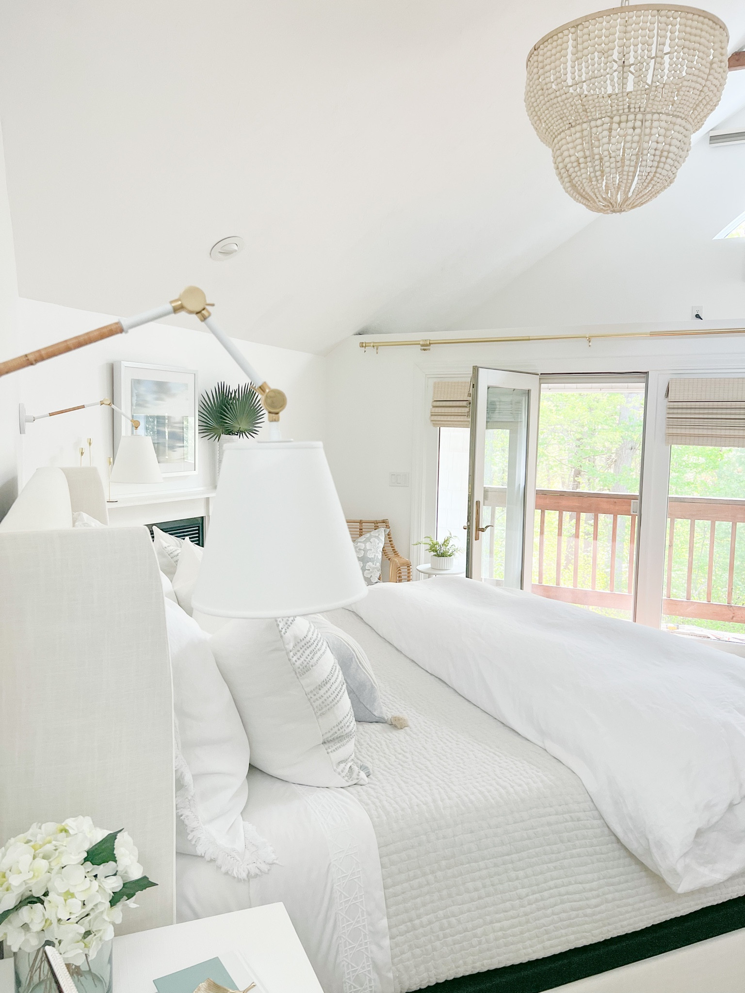 A sneak peak at my primary bedroom updates! Still have a few more updates to make including drapes, rug, artwork and accessories, which will add all of the warmth and coziness. I’ll link everything that I’ve purchased though, even though I’m still waiting on several items to arrive!

Also, my bed is more than 30% off right now and ships free! 
-
coastal decor, beach house decor, beach decor, beach style, coastal home, coastal home decor, coastal decorating, coastal interiors, coastal house decor, home accessories decor, coastal accessories, beach style, blue and white home, blue and white decor, neutral home decor, neutral home, natural home decor, master bedroom decor, master bedroom ideas, primary bedroom decor, coastal bedroom, coastal bedding, neutral bedding, rattan accent chair, serena & lily sconces, white beaded chandelier, primary bedroom chandelier, master bedroom chandelier, large chandelier, statement chandelier, coastal chandelier, bedroom sconces, wood bead chandelier, neutral bedroom, nightstand sconces, task sconces, linen pillow shams, blue and white pillows, serena & lily pillows, upholstered bed, venice rattan chair, woven shades, white nightstands, primary bedroom nightstands, coastal farmhouse, mantel decor

#LTKhome #LTKsalealert #LTKstyletip