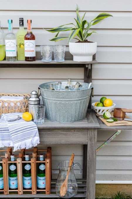 One way we styled the Walmart fluted planter! Use a potting station for your outdoor party setup! 

Outdoor entertainment, ice, bucket, outdoor party, outdoor living

#LTKSeasonal