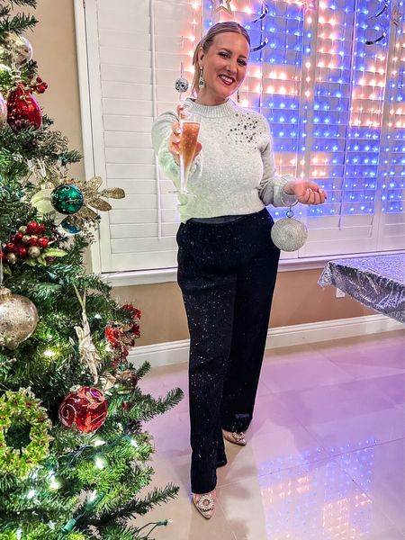 NYE outfit for cold weather, black sequin pants outfit, ootd New Year’s Eve, party sparkly outfit, transparent heels, slicked ponytail look 

#LTKSeasonal #LTKstyletip #LTKparties