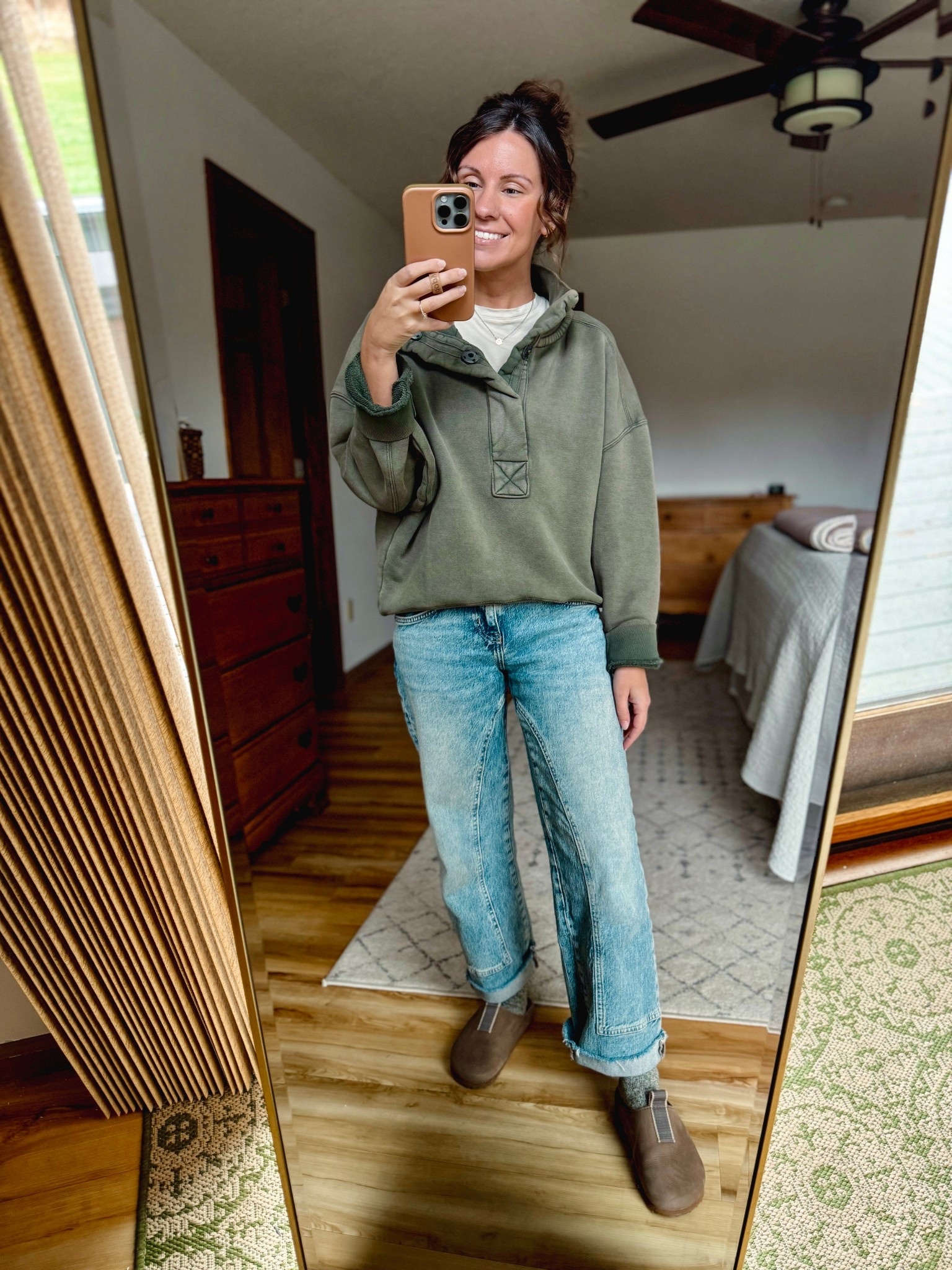 Wearing size small in my tee, xs in my sweatshirt, 24 short in my jeans, and my true size in my clogs 