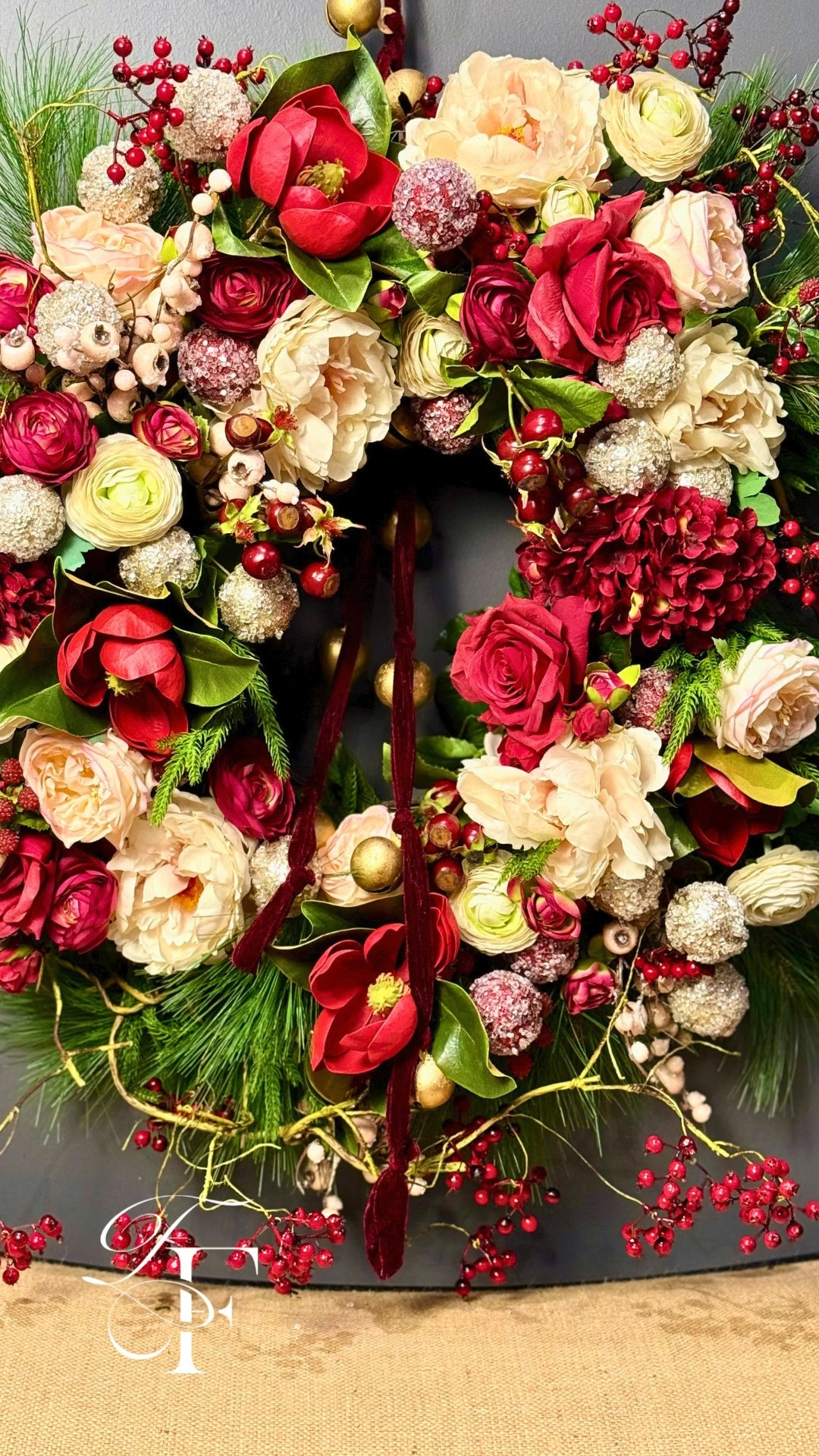 Faux Flower Artistry!
Beautiful Christmas wreath with red, pink and champagne accents. 
This wreath would look lovely on a fireplace mantel or hanging on a mirror, or a front door. All Flowers are faux. 💐🎁🎄 

 #LTKHoliday #LTKSeasonal #LTKHome