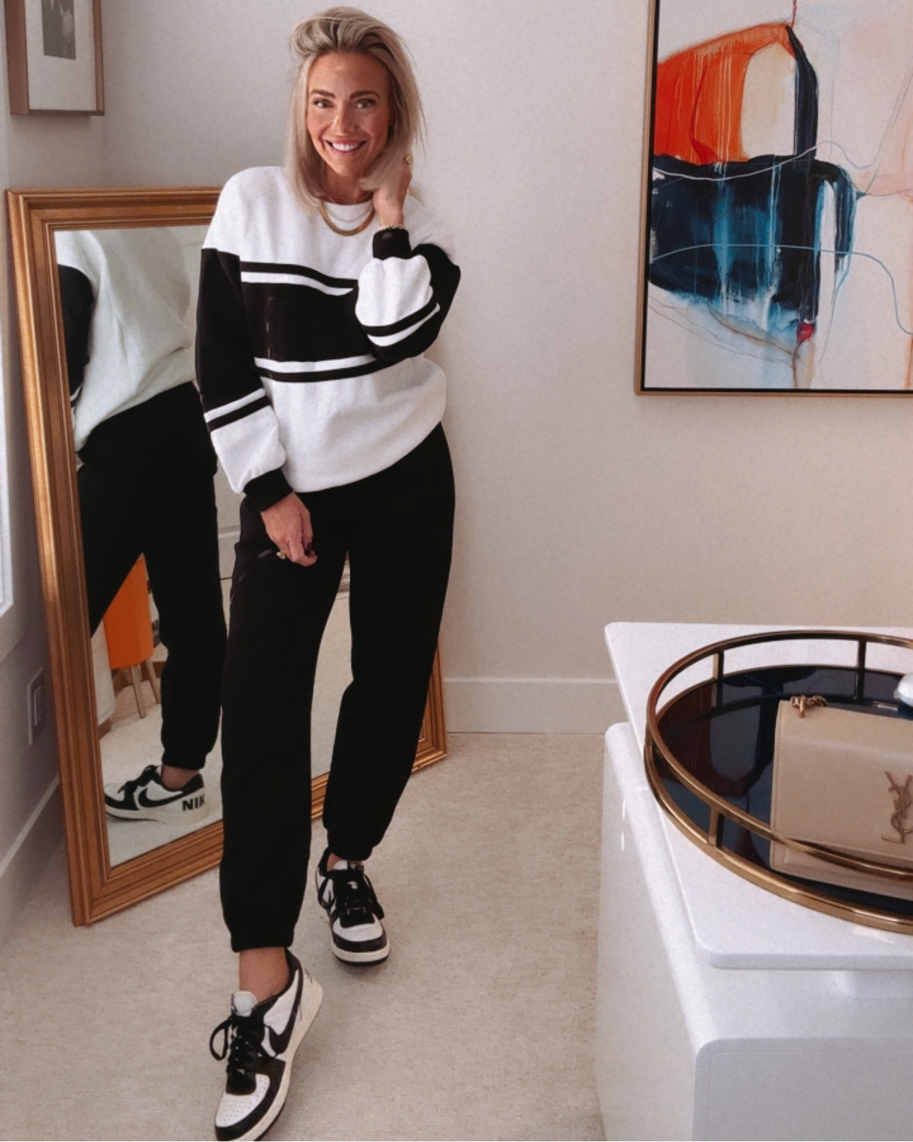 THE black & white sweatsuit combo you are going to LOVE & LIVE IN! Wearing a SMALL in this incredible set. It is SO comfy, so affordable 🙌 and so chic! I will be wearing this all fall 🍁🍂 running errands, on a cozy day in the house by the fire 🔥 and let’s be honest - we’re sleeping in it too! 😂

Next up - these Nike’s are so so SO COOL! My hubby loves when I wear them because they are so sporty yet so fashionable!!!

The dunks are MENS SIZING so order 1.5 sizes down (I’m a 9 womens and a 7.5 men’s) for example. 

These kicks go with everything!

Also, I’m obsessed with these new square diamond studs from my girls at Melinda Maria! Make sure to use code CORRINNE for 10% off your entire order! 

Linked everything I am wearing & some other options I own & love ❤️ 

DM me with any questions! Can’t wait to see this on you girls!

Xoxo-your girl for the latest beauty & fashion trends,

CeCe 🙏💣🤍🔥🍁🍂🫶😍🙌⭐️


#LTKWorkWear #LTKMidSize #LTKVacationOutfits #CorMyerStyle #Concert #Vacation   #LTKSummerSales #LTKBacktoSchool               

#LTKSeasonal #LTKFindsUnder50 #LTKBeauty #LTKStyleTip #LTKFindsUnder100 #LTKTravel #LTKFitness #LTKOver40 #LTKParties #LTKU #LTKSaleAlert #LTKVideo #LTKBump #LTKShoeCrush #LTKActive #LTKShoeCrush #LTKBump #LTKFamily #LTKPlusSize #LTKMidsize #LTKSaleAlert #LTKNYFW #LTKBump #LTKFindsUnder50 #LTKActive