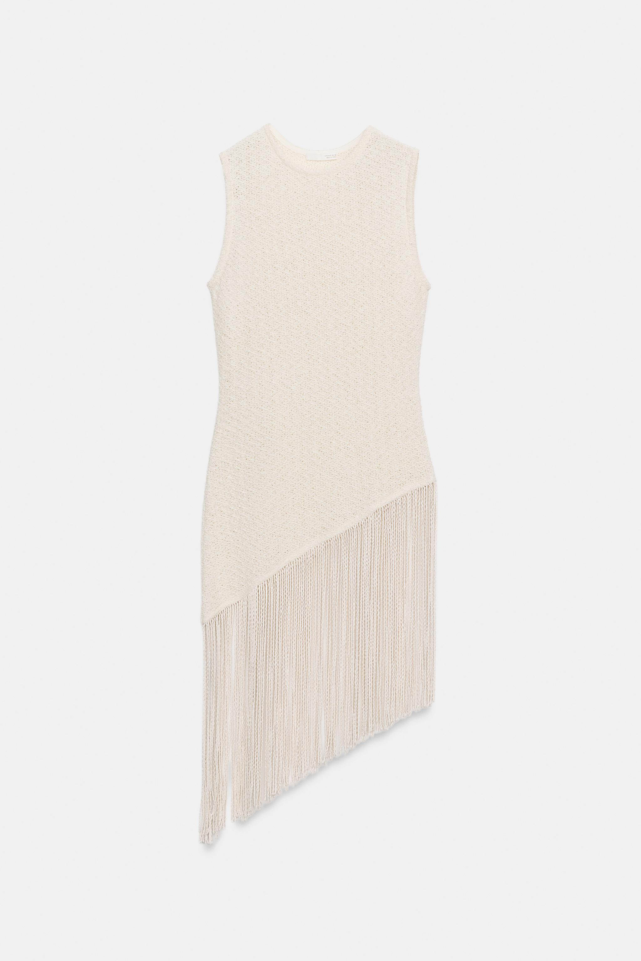 Model height: 177 cmTop made from a cotton blend yarn. Round neck, sleeveless. Featuring matching... | Zara UK