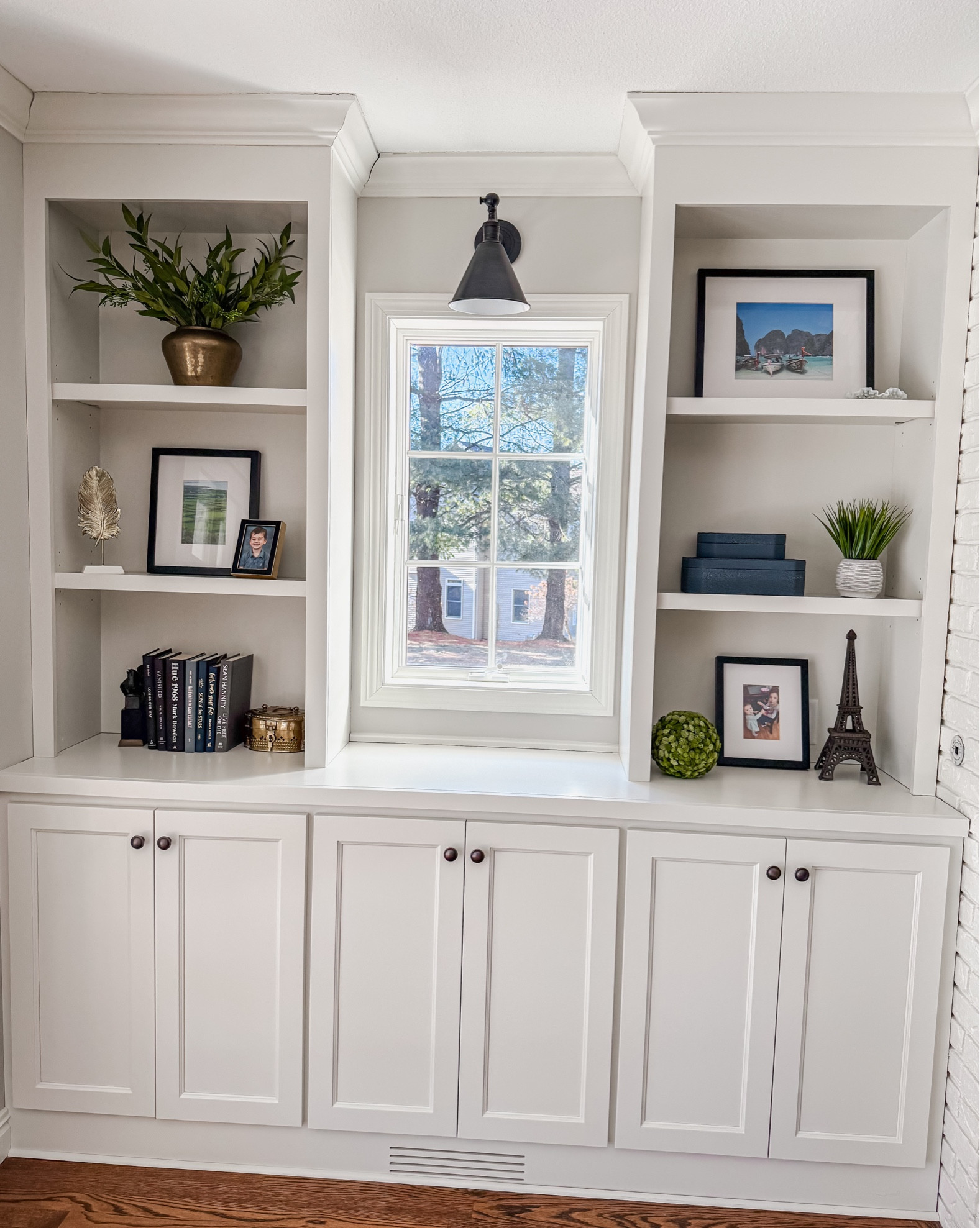 Traditional bookshelf decor with shagreen boxes from Target, frames from Pottery Barn mixed with antique and vintage finds!

#LTKHome