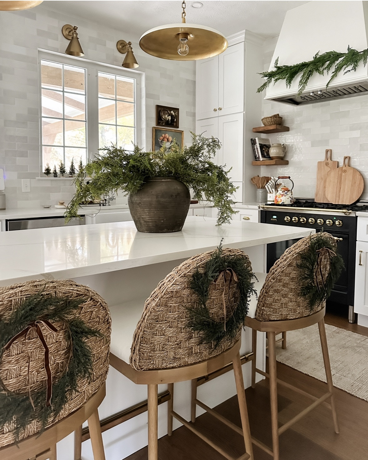 Holiday kitchen vibes. Embracing the mini wreath on chairs look and fully enjoying not having to tie my own bows with these premade Amazon ones. 💙

I purchased the 5 x 7 3/8” bow size, for reference. And my wreaths (old, unlinkable) are 8 inches. 

#LTKHome #LTKHoliday #LTKSeasonal