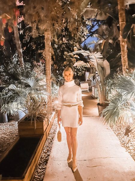 I took a secret pathway through Swifty's at the Colony Hotel and found this enchanting palm tree garden! There are many reasons why The Colony is iconic to Palm Beach. For me, it's the natural opulence and serene beauty. 

In this photo, I'm dressed for "Think to Drink," a trivia event hosted every Monday night. If you are local to the area or are contemplating a visit to Palm Beach, I highly recommend you participate in the famous trivia night. It's always such fun!

Dressed to win, I'm wearing a lightweight sweater dress from Amazon Fashion, cinched at the waist with a vintage Chanel tweed belt. I matched the dress with my favorite natural point-toe pumps and a small handbag. Dainty pearl earrings and a neat updo complete the look!

Shop my LTK Feed to get this "cleverly coordinated" smart look.

#LTKunder50 #LTKstyletip #LTKFind