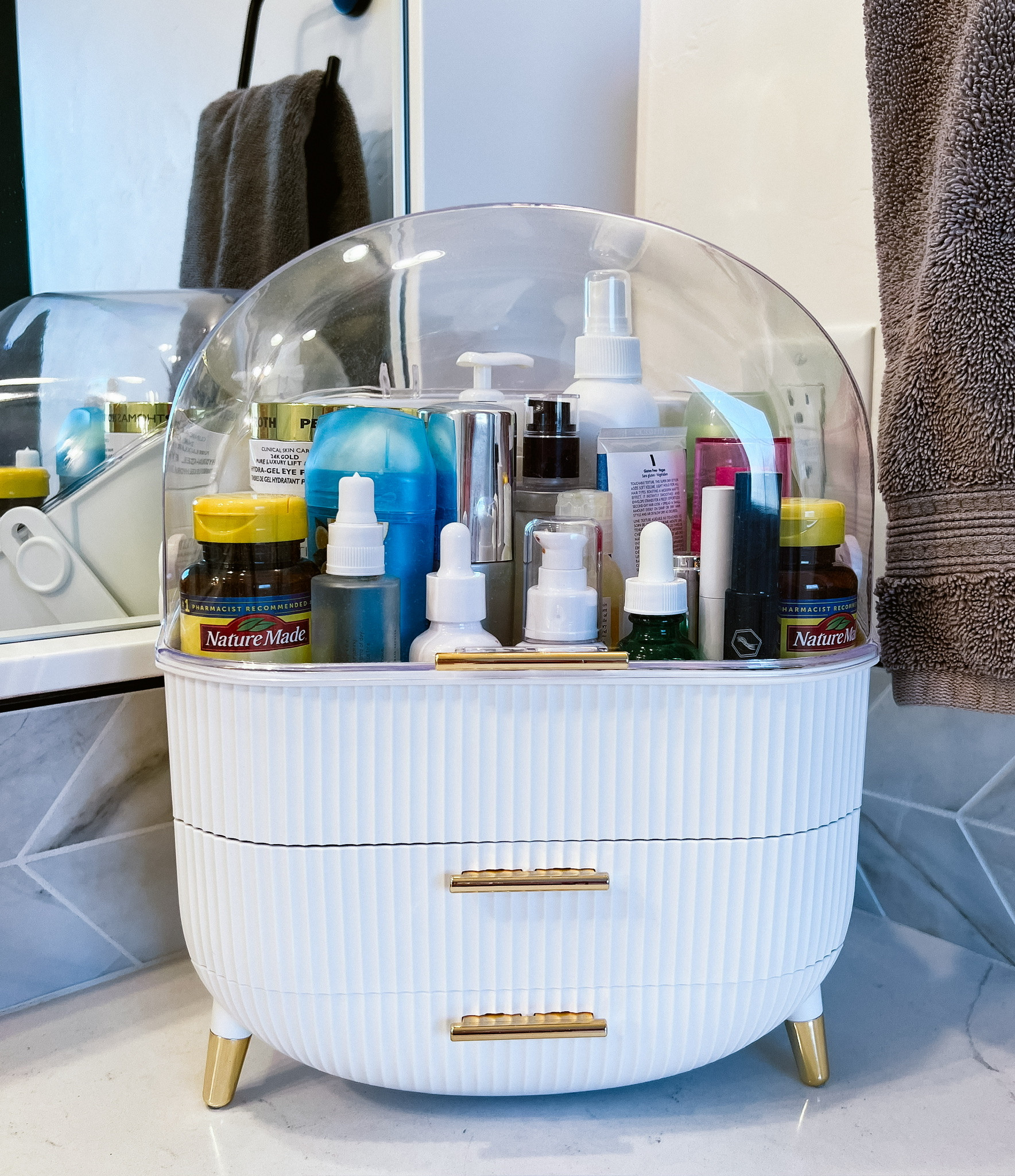 Love this makeup organizer! It’s the perfect way to organize your counter space while looking adorable! 

Makeup organizers, Home finds, Bathroom organizer, Bathroom countertop, Organization finds, Home inspo 

#LTKHoliday #LTKStyleTip