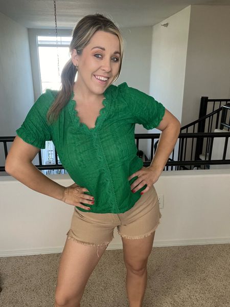 Eyelet puff sleeve t shirt
Work shirt
Blouse shirt top for larger chest
Green blouse 
Green tshirt 

Khaki Wide leg denim shorts split framed hem jean shorts 

#LTKworkwear #LTKunder50 #LTKcurves