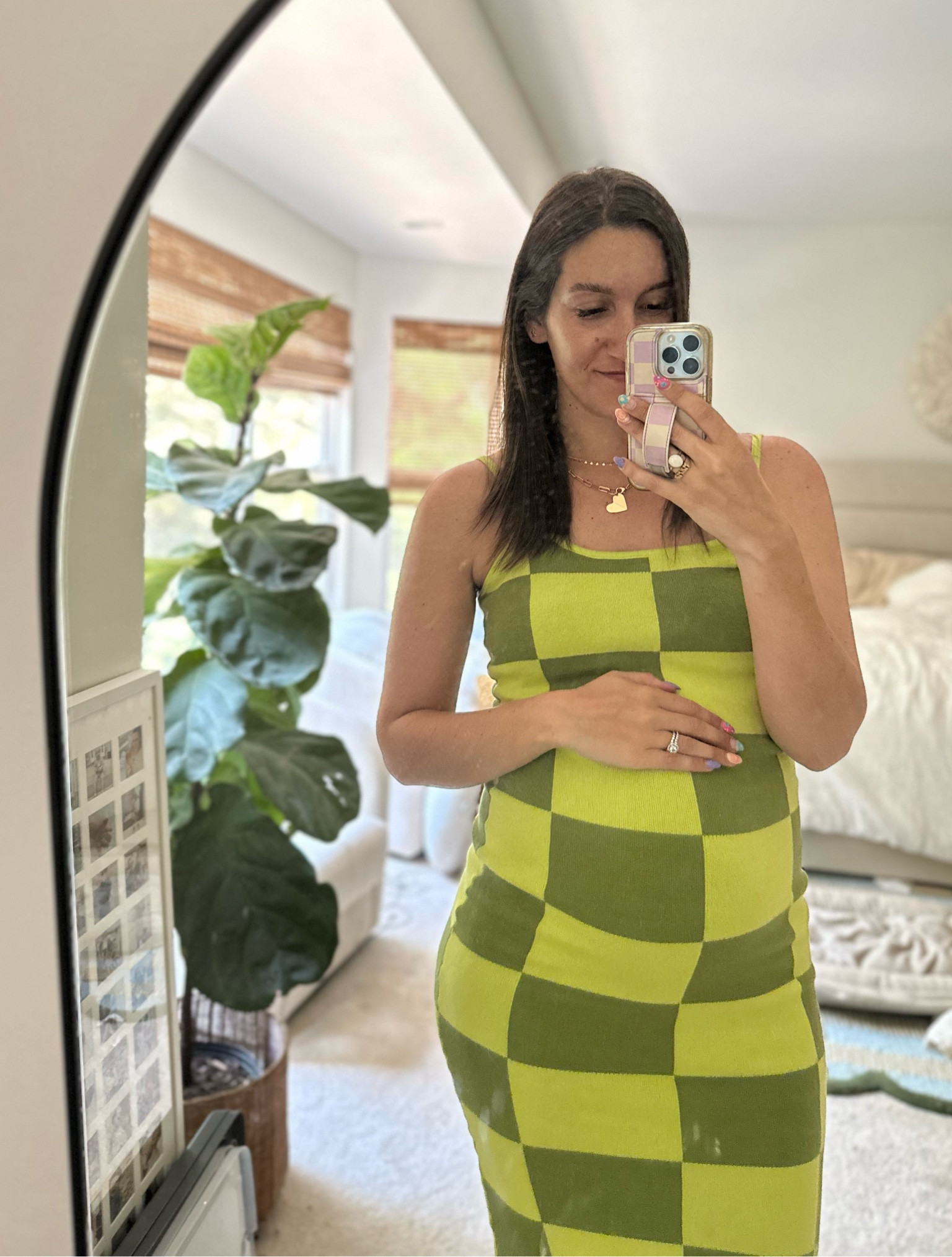 Size medium— fits true to size, nice and stretchy with the bump 
