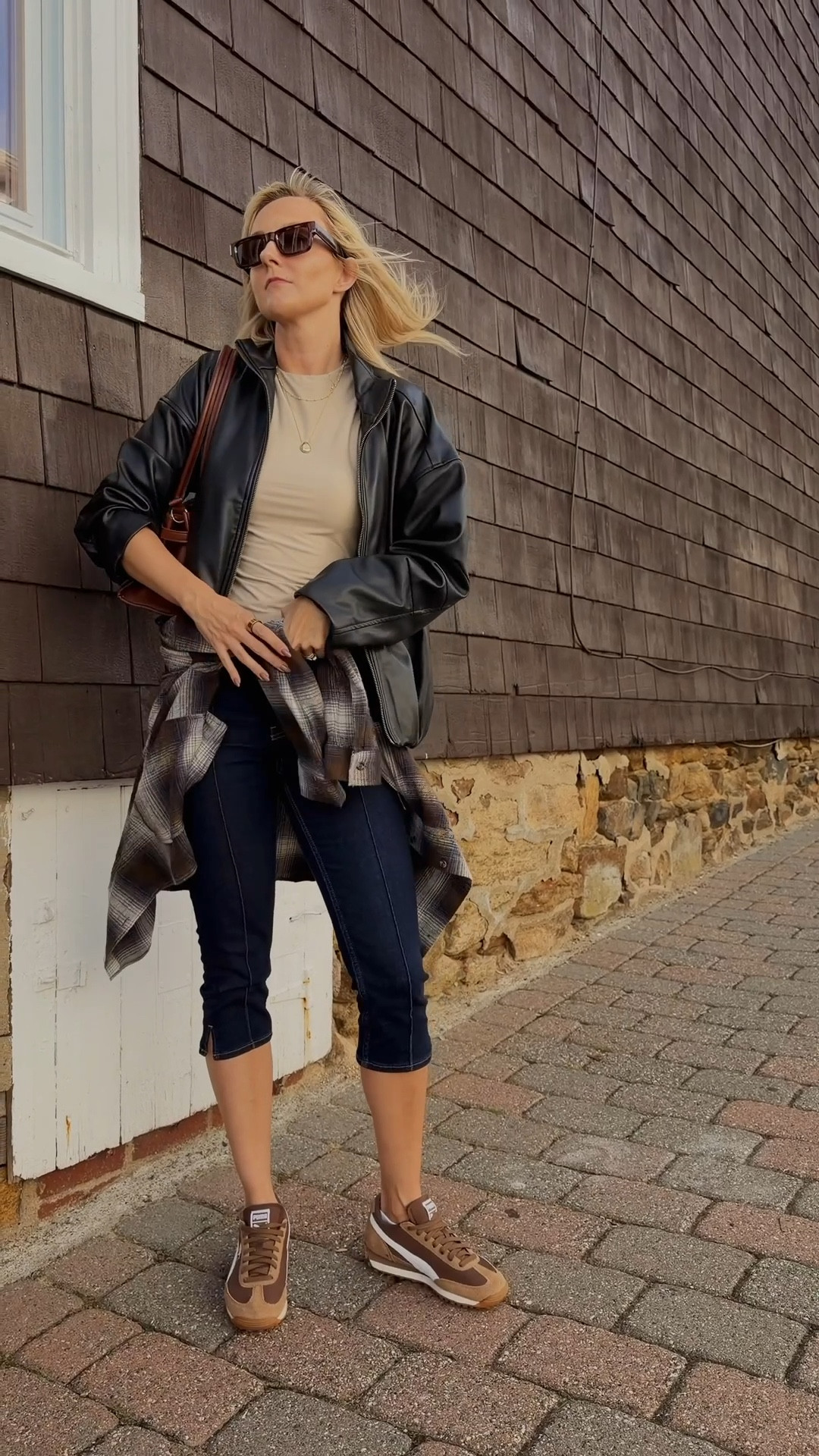 This plaid shirt is part of my transitional outwear - wearing it on the waist is one of my latest fav options! Thick, warm and oversized! Matched it with denim capris & leather jacket 

Plaid shirt outfit • flannel shirt • thanksgiving outfit • fall outfits • fall 2025 + streetwear • brown sneakers • puma sneakers 

#LTKHoliday #LTKTall #LTKootd