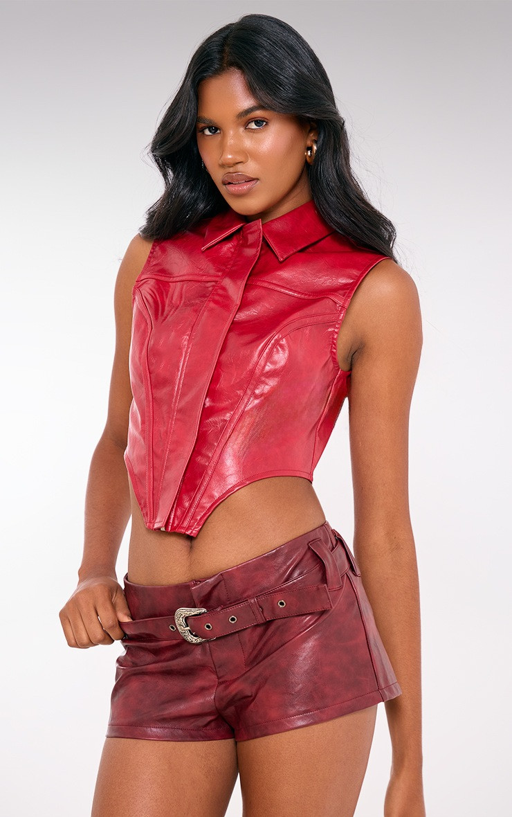 Red Faux Leather Zip Up Dip Hem Long Top | PrettyLittleThing UK