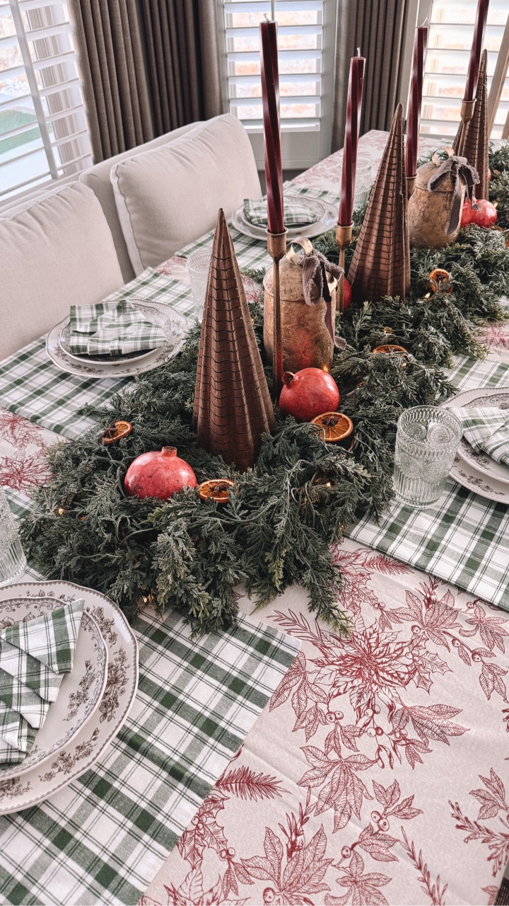 Finished our table setting this past weekend. The natural elements are just the color and texture I was looking for! 
The girls have been eating the pomegranates so they don’t go bad so I need to replace the now  empty spots with some fresh ones! 

#homedesign #homedecor #neutralhome #homeinspo #homeinterior #christmasdecor #christmastable #christmassetting #tablesettingideas #tablesetting #homestyle
