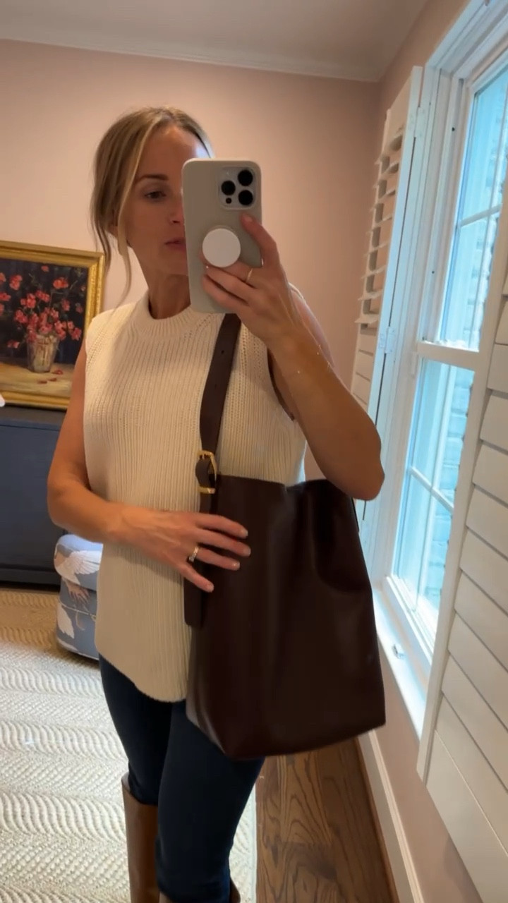 This brown tote from Madewell is absolutely beautiful and would make a perfect work bag since it’ll definitely fit a laptop. I love the buckle on the adjustable strap, the perfect chocolatey color, and the gorgeous leather. This would make a GORGEOUS fall purse. I might even say to add this to your wishlist for Christmas. #LTKGiftGuide #LTKGiftGuide

#LTKSeasonal#LTKitbag#LTKSeasonal#LTKitbag
