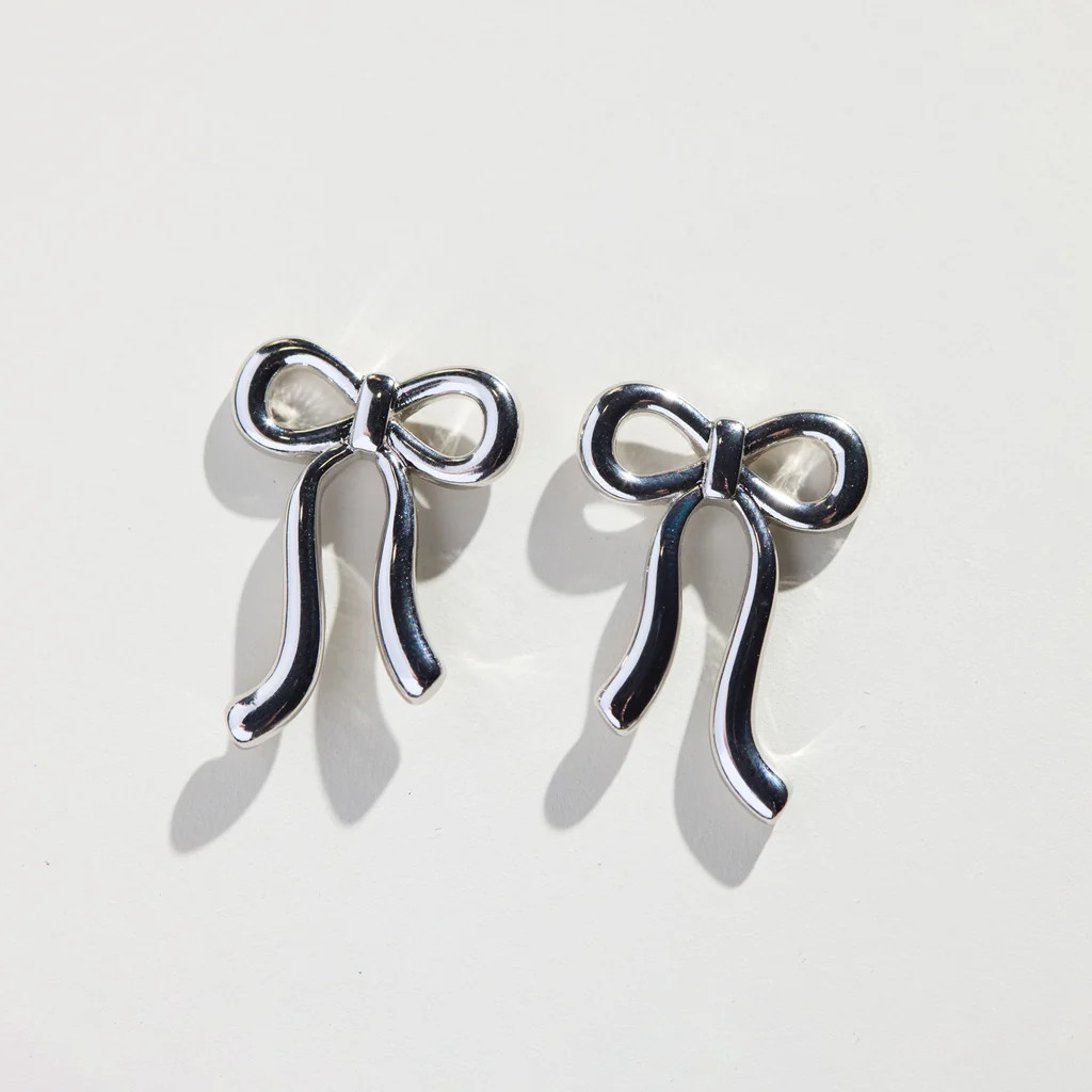 Silver Vintage Bow Studs | Nickel and Suede