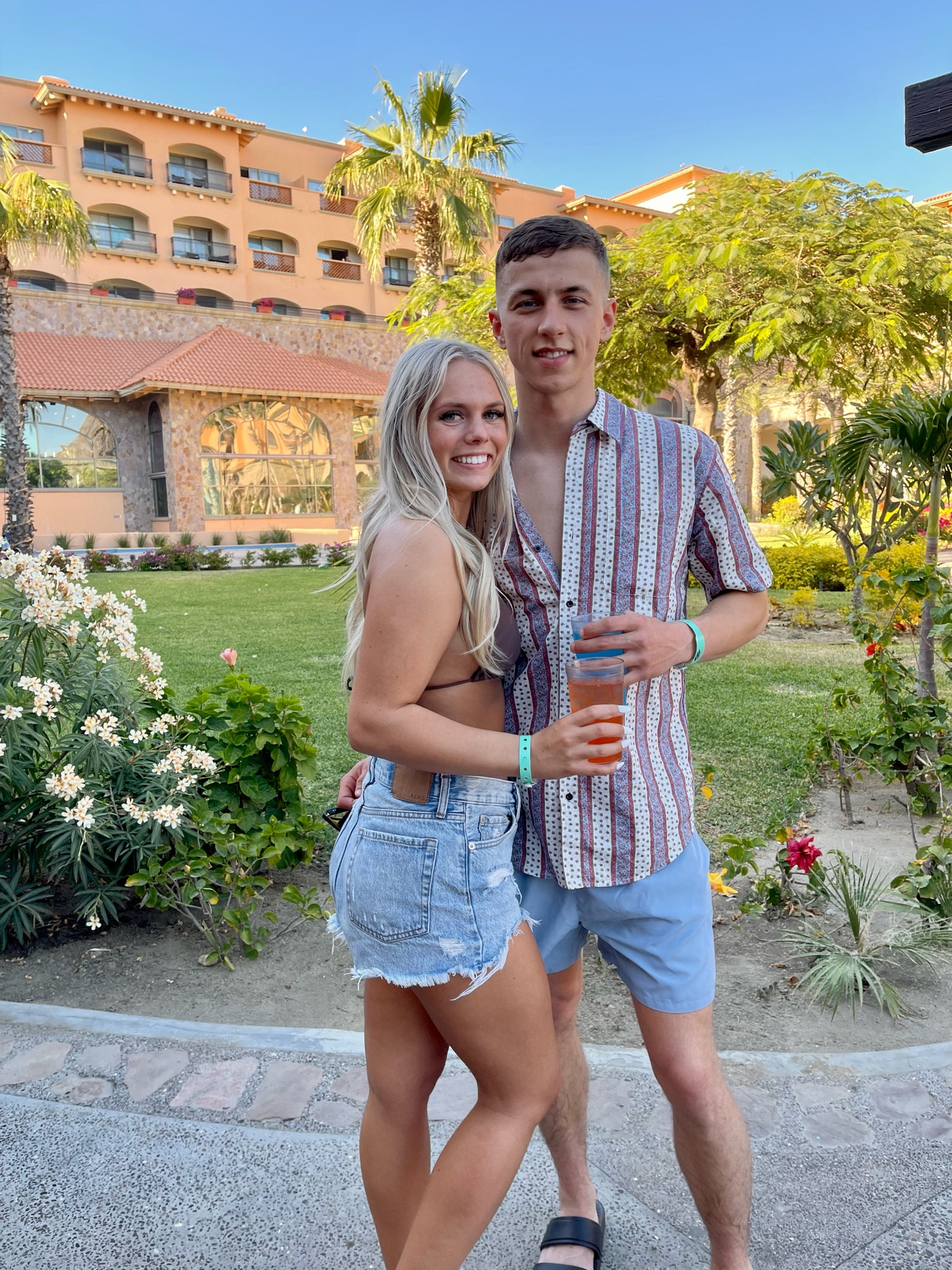 VACATION MODE - 
Comfortable outfits to walk around and explore your vacation destinations! In this outfit I paired a bikini with a pair of Jean shorts! My husband paired a striped shirt with a pair of swim shorts. 

#LTKTravel #LTKSwim #LTKFindsUnder50