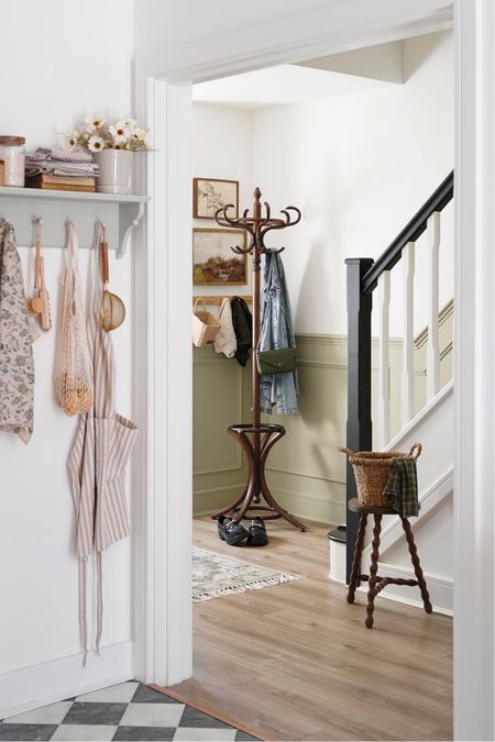 french bobbin stool, antique coat rack, green paint, peg rail, open shelf, vintage rug, vintage art