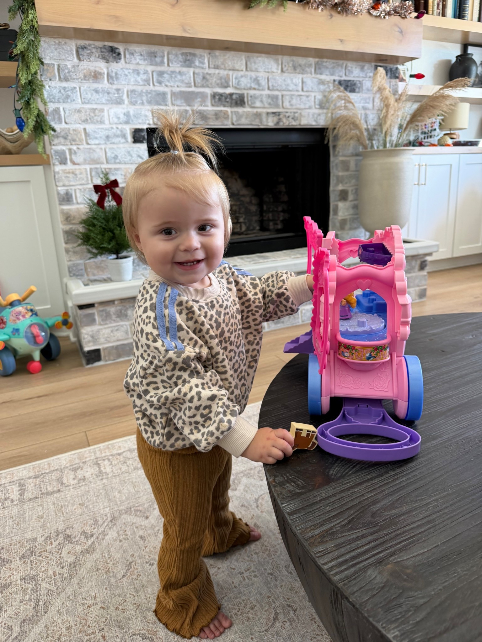 We sized up in this leopard toddler sweatshirt. She loves this little people Princess chariot! Great gift idea for toddlers. 

#LTKGiftGuide #LTKBaby #LTKKids