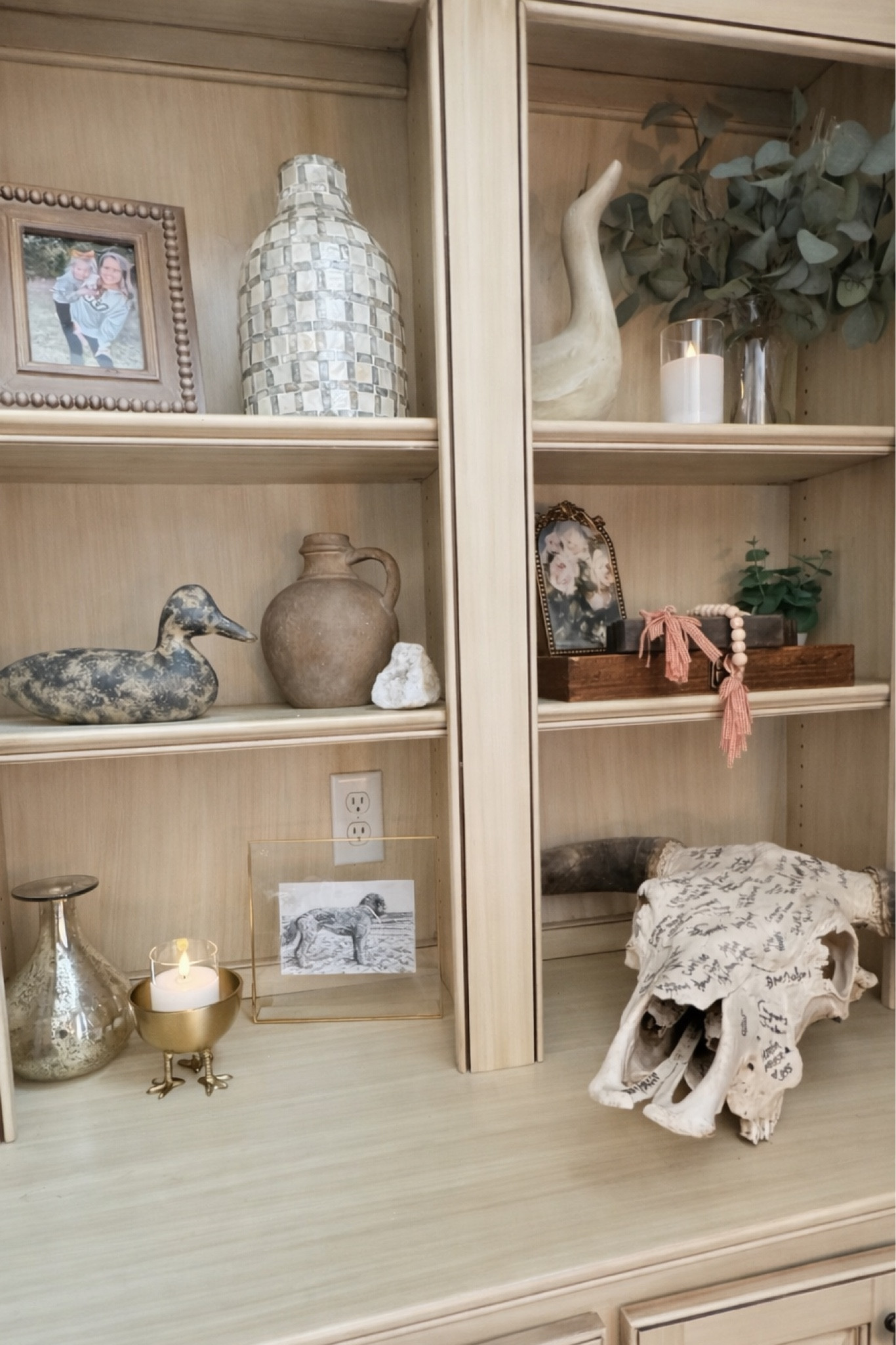 One of my favorite ways to make built-ins feel cozy is layering books, natural textures, greenery, and a few personal pieces. I love mixing vintage-style finds with affordable Amazon decor to create shelves that feel collected over time.

I linked similar pieces including the decor books, greenery, candle holders, frames, and shelf styling accents I used here.

#ltkhome #shelfdecor #builtinstyling #amazonhomefinds #neutralhomedecor #homestyling #cozyhome

#LTKHome