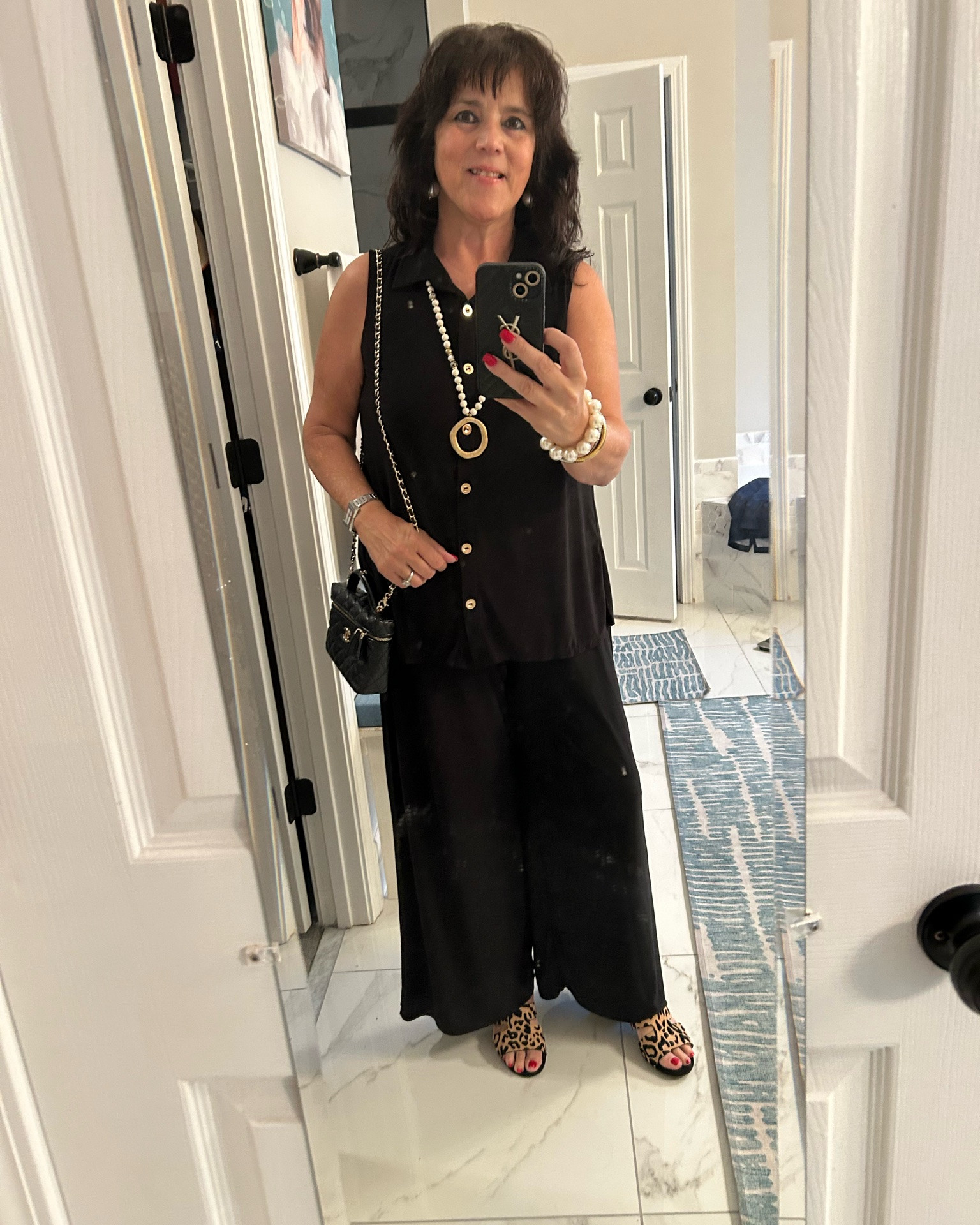 Black is always classy in summer!! Simple, comfy, and a little dressy with fun accessories and those leopard slides 🖤 Always be confident!
#summeroutfitideas #styleover50 #over50fashion #midlifestyle #summeroutfit

#LTKdayinmylife #LTKMidsize #LTKootd