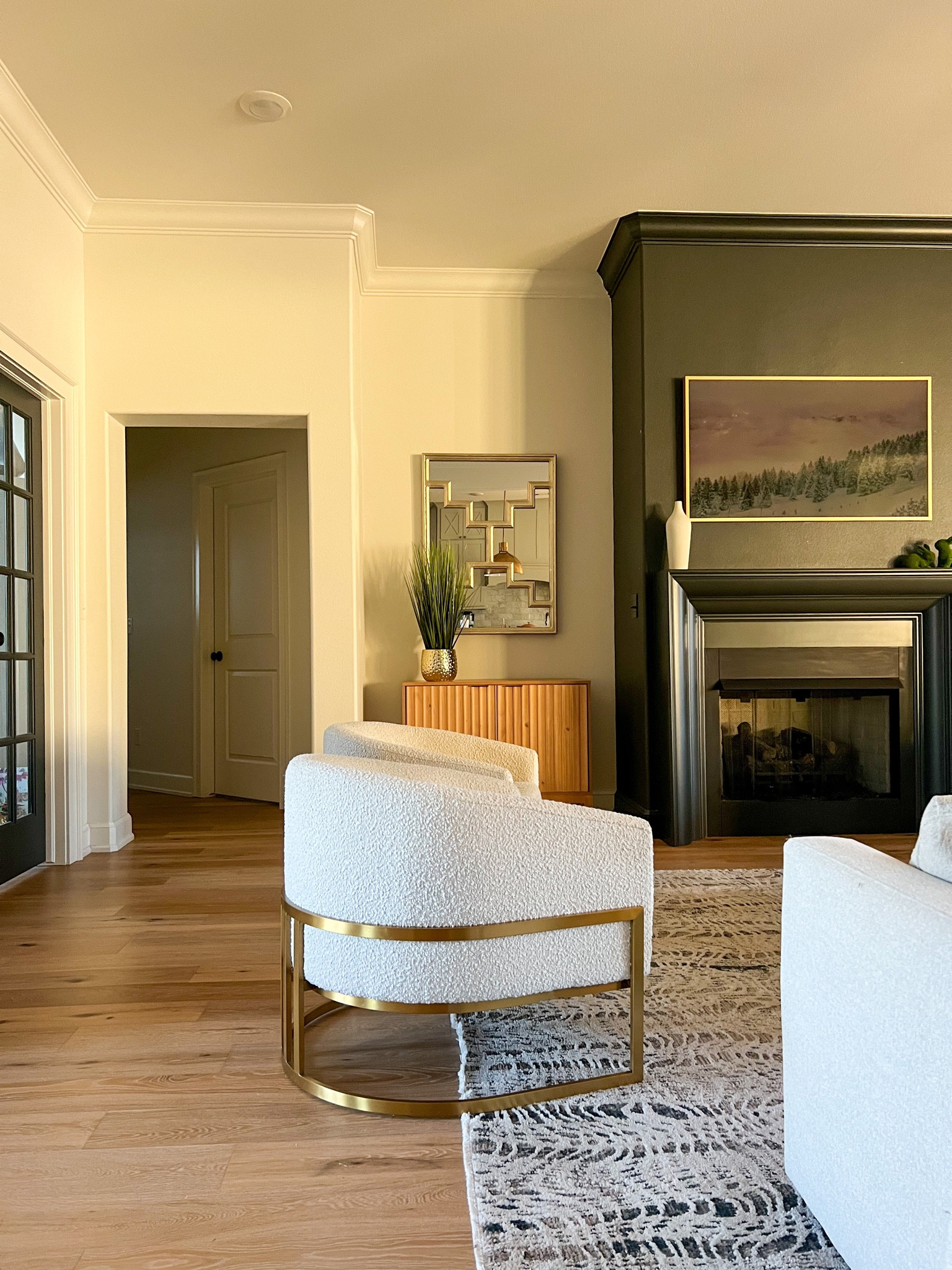 Take a seat! Quickly, because these boucle chairs are back AND the lowest price I’ve seen. I’m contemplating getting two more to mirror the other side of the living room so don’t sell them out just yet. The scalloped cabinets back there are also available again. I love the detail so much I have two in here on either side of the fireplace and the nightstands in my guest room.  If you love the shape of the chairs but not the boucle, there are some options tagged for you too. 

home interiors, interior styling, living room, boucle chair, home design, chair

#LTKstyletip #LTKhome