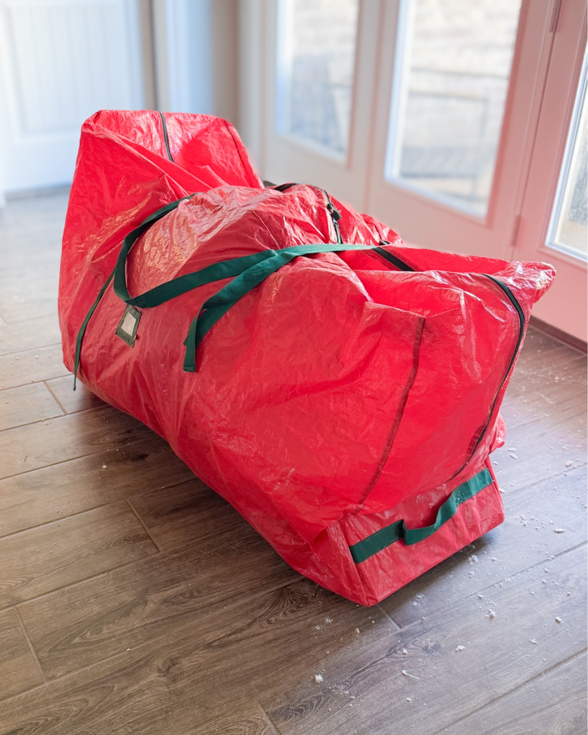 Christmas tree storage bag! One side has wheels and the straps are adjustable for a good, snug fit. Size large fit our 9 ft. tree🎄

#LTKSeasonal #LTKHome #LTKFindsUnder50