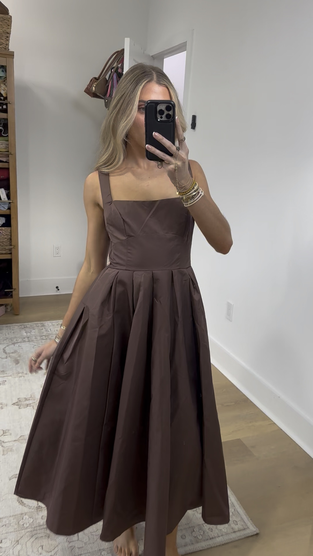 @ladyblacktie dress size small. A refined cocoa brown midi dress crafted from solid woven fabric. This piece showcases a clean straight neckline, delicate straps, and a gracefully full skirt that moves with understated elegance. The distinctive low back adds subtle allure, while a zipper closure ensures a polished finish. Timeless sophistication for any occasion

#LTKWedding #LTKootd #LTKFindsUnder100