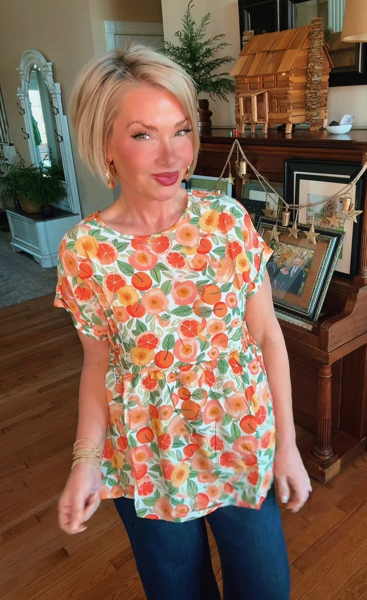 The floral top has a clean, structured fit through the shoulders and bust, with a gentle flow through the waist that’s both flattering and comfortable. The bright citrus-inspired print adds interest without being overwhelming, making it a great statement piece that still feels classic. The length is ideal for pairing with denim, offering coverage while maintaining a tailored look.  Styled with dark-wash jeans, the overall look is balanced and refined, perfect for everyday wear. It transitions easily from casual daytime errands to a relaxed lunch or casual meeting. Fresh, feminine, and effortlessly put together.

#LTKPlusSize #LTKSaleAlert #LTKSeasonal