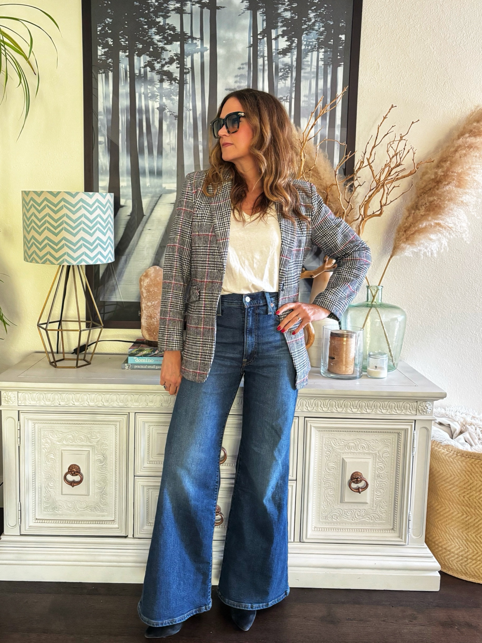 I finally did it.  I bought a pair of high waisted bell bottom jeans.  I have been very against the newer Jean styles because I didn’t think they worked with my body type but I think this looks cute, actually.  

#LTKstyletip #LTKover40 #LTKfindsunder100