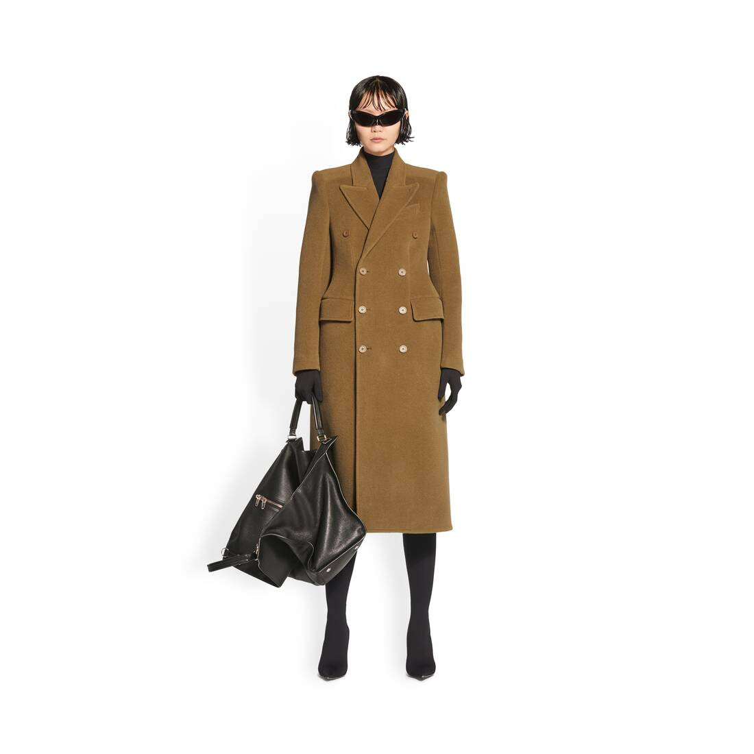 Swing Large Bag in black grained calfskin with aged-silver hardware is in several looks of the Ba... | Balenciaga