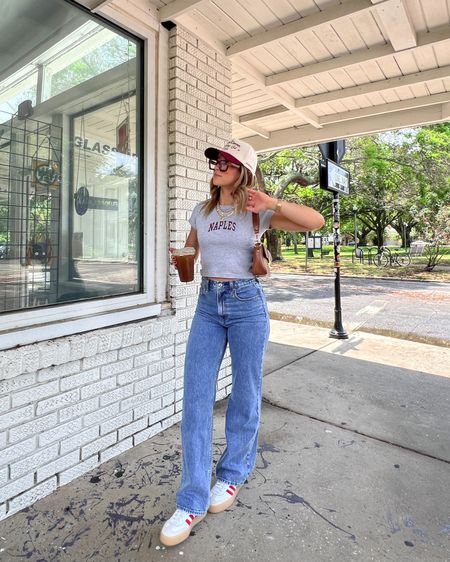 5/15/24 Casual basic outfit inspo 🫶🏼 Abercrombie jeans, Abercrombie loose jeans, loose jeans outfit, loose jeans, medium wash denim, trucker hat, trucker hat outfit, casual summer outfits, casual summer fashion, denim jeans outfit, Adidas sambae sneakers, red Adidas sneakers, Adidas sneakers outfit