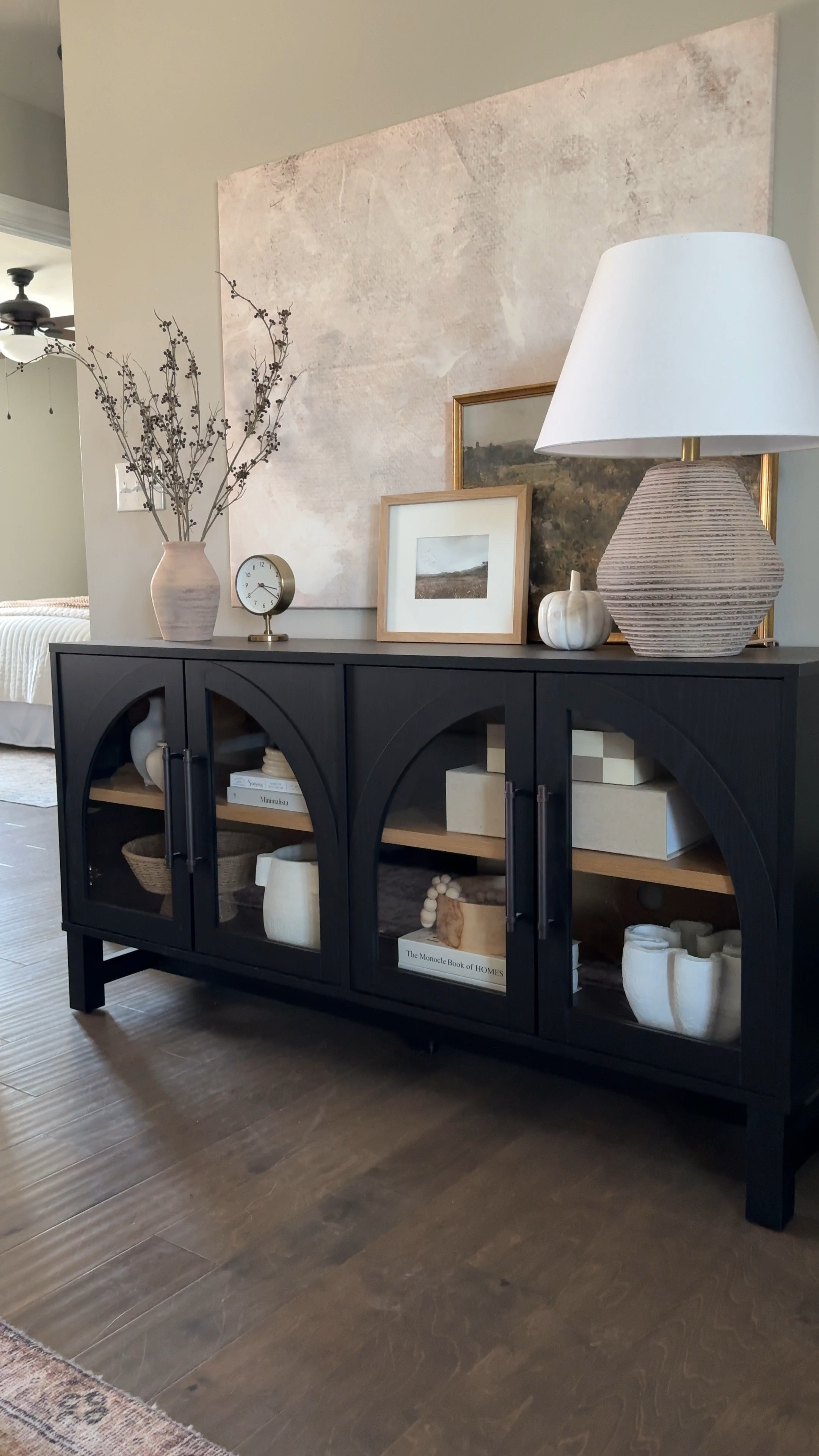 Sharing another simple and easy cabinet styling for fall! I just swapped out my spring/summer stems for this arrangement, updated the artwork in the smaller frame, and added a marble pumpkin 🤍🍁

#LTKHome #LTKVideo #LTKStyleTip