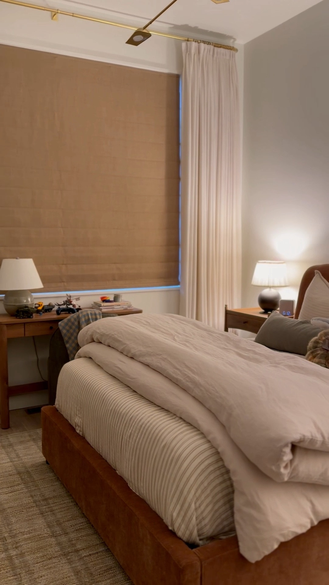 Shop my sons room! The blackout Roman shade is in Golden Ecru fabric.