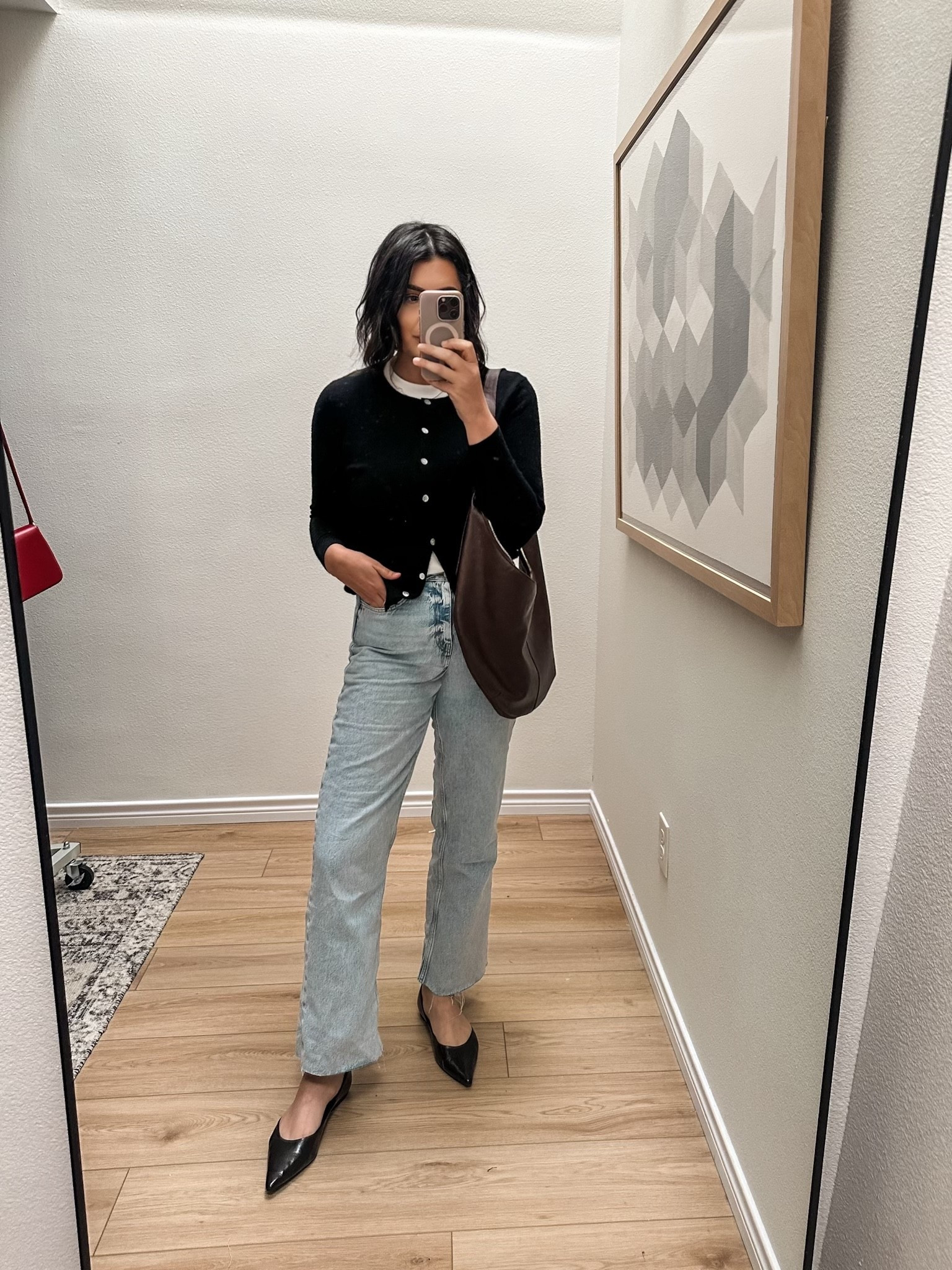WIW yesterday 🖤 channeling my inner Dakota Johnson with this Quince cardigan. I’m in the medium.

I’m in the 10 of the jeans! TTS.