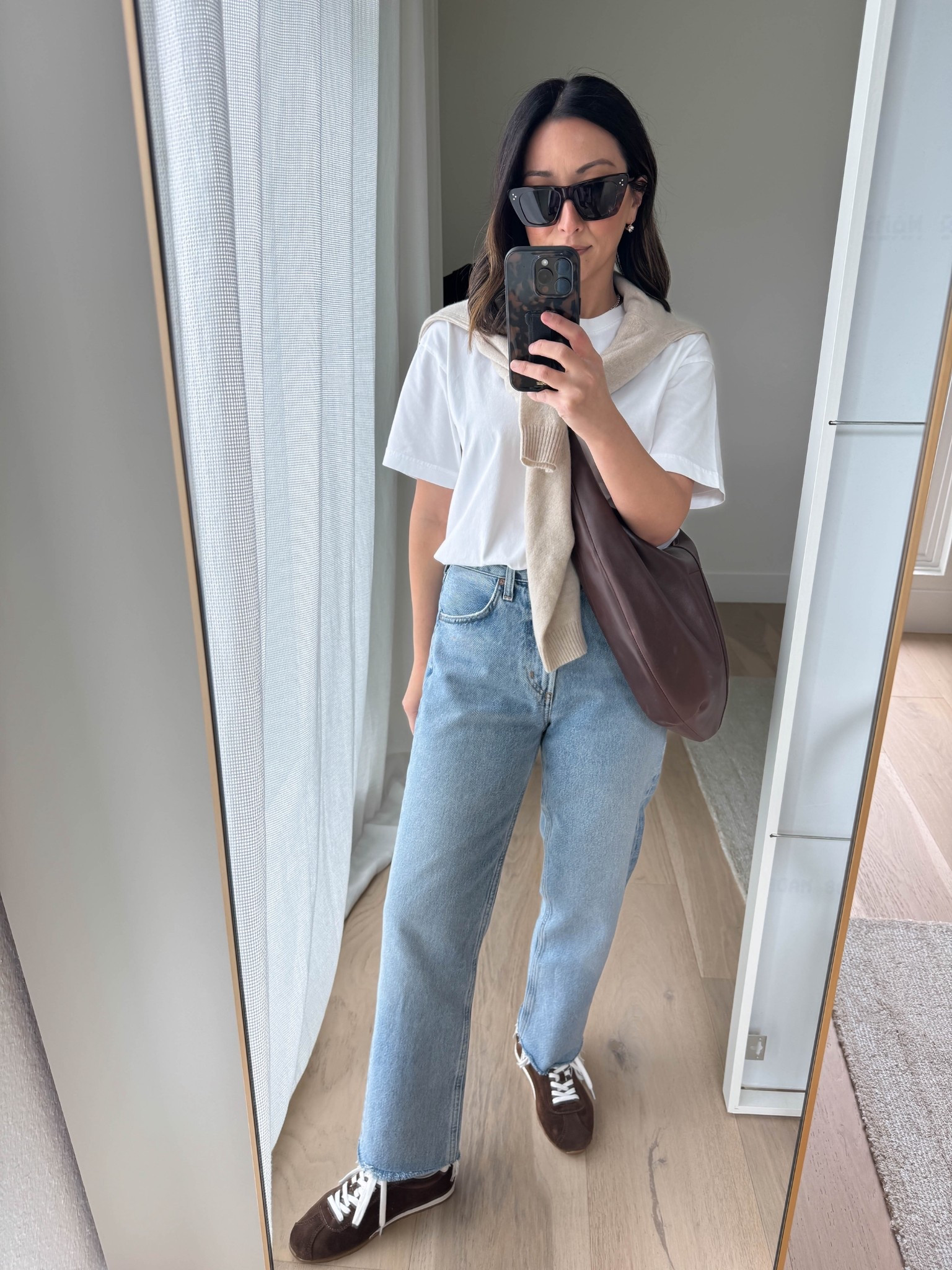 Elevated jeans and tee outfit with the best suede sneakers. 

Madewell tee xs
J.crew cashmere sweater xs
Agolde Valen jeans 24 - cut hems
Amazon socks 
Dolce Vita sneakers 6 - size up!
Madewell sling bag - old
Celine sunglasses  

Petite style, spring outfits 2026, sneakers 

#LTKmomlife #LTKootd #LTKPetite