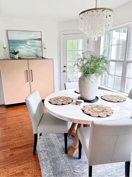 Just ordered this marble dining table to go in our kitchen! Making our existing chairs work by tying in pops of black but they do have matching chairs sold separately! The hutch/cabinet we made so I’ll link similar —Linked the sealer I used to put on the marble before use so we didn’t get water spots! I did 2 coats!

Dining table, marble table, round dining table, kitchen dining, home decor

#LTKStyleTip #LTKHome #LTKFindsUnder100