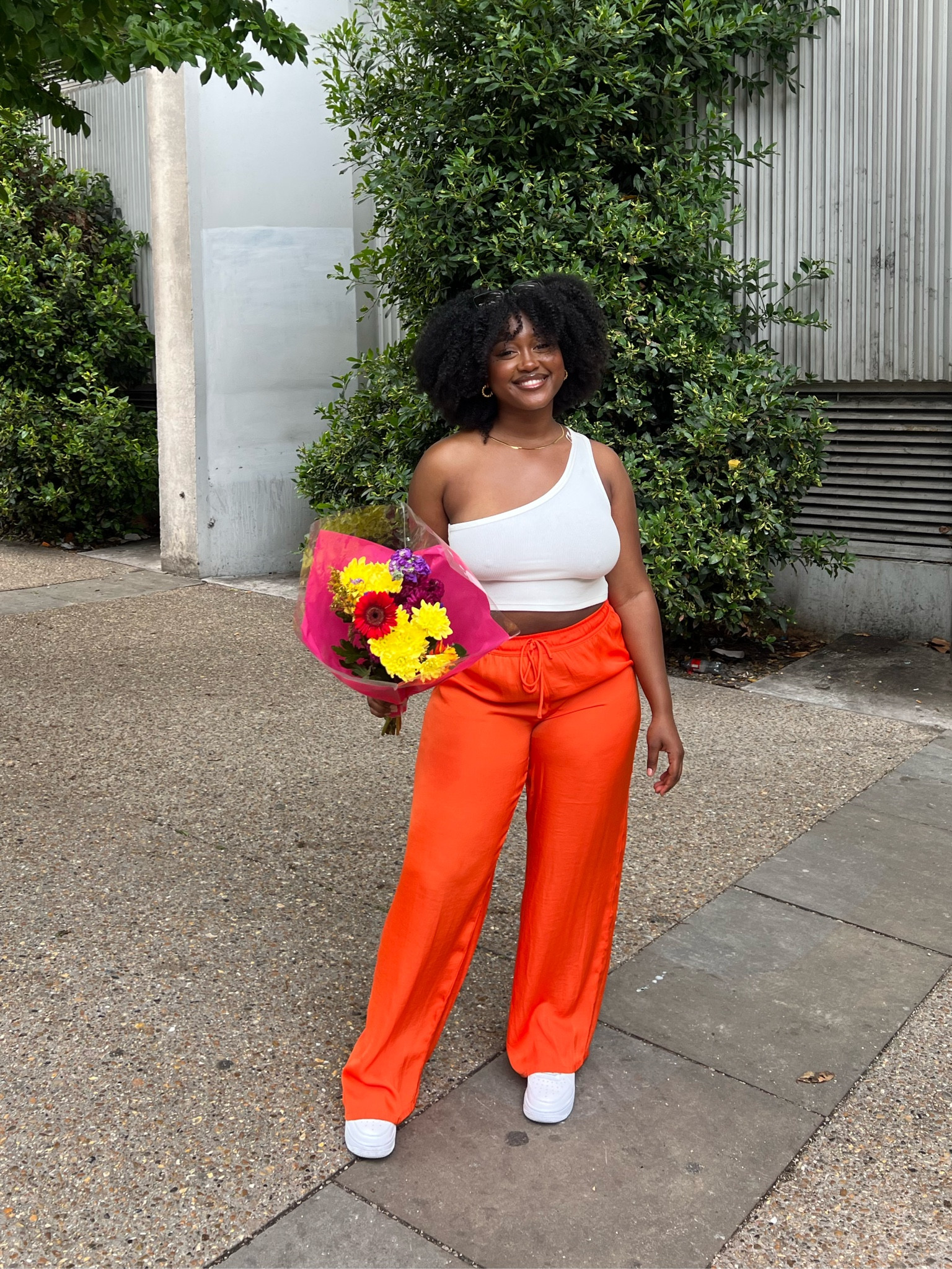 In my Jordan Year 🥳

White asymmetrical ribbed top, orange wide leg trousers, white Nike Air Force 1s, Afro Hair, black sunglasses

#LTKunder50 #LTKFind #LTKstyletip