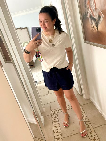 Easy outfit in crewneck t-shirt and navy linen shorts, paired with metallic silver ankle strap sandals 
Shorts run big, size down 


#LTKshoecrush #LTKfindsunder100 #LTKSeasonal
