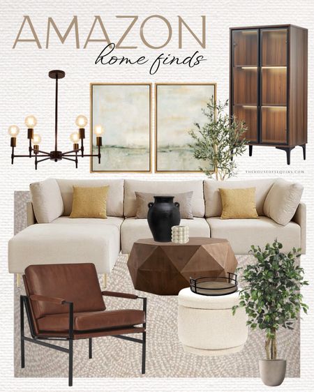 Shop Amazon home finds! Rustic Modern, moody living room. Sectional sofa, glass cabinet, coffee table, boucle ottoman, faux olive tree, leather armchair, framed wall art, bronze chandelier, Pottery Barn & Arhaus looks for less! 

Follow my shop @thehouseofsequins on the @shop.LTK app to shop this post and get my exclusive app-only content!

#liketkit 
@shop.ltk
https://liketk.it/4fAC3

#LTKhome #LTKsalealert #LTKstyletip