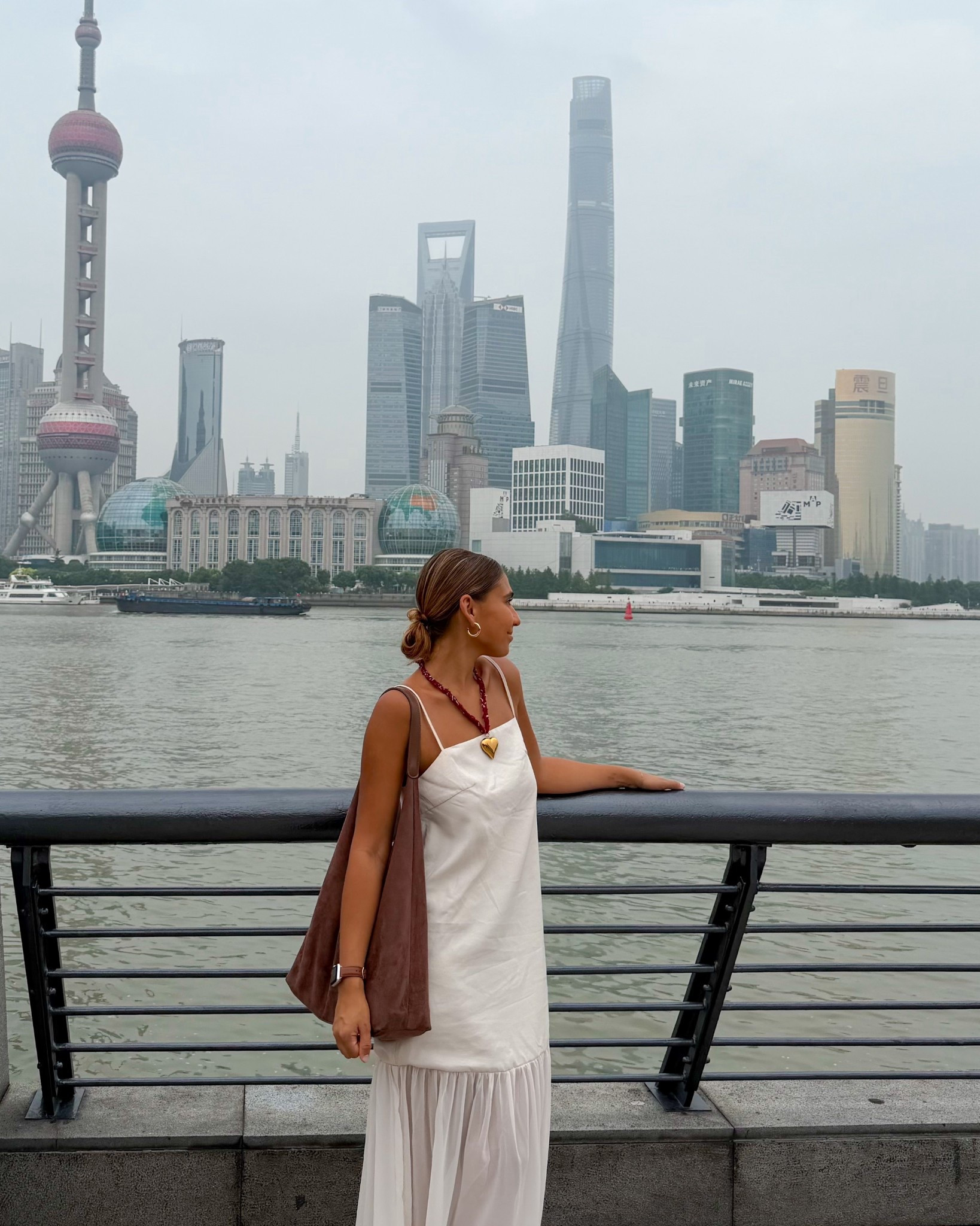 outfit in shanghai — perfect lightweight and flowy dress! 

#LTKFindsUnder50 #LTKStyleTip #LTKTravel
