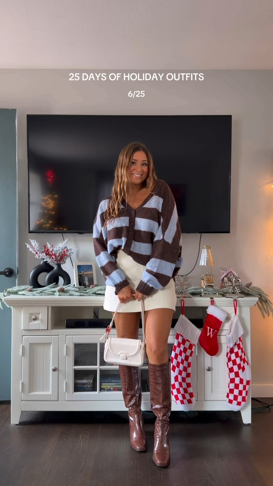 cozy holiday outfit idea! oversized striped sweater is so cozy 🧸🏂 wearing my true size. mini skirt comes as a set, love wearing each piece separately! boots fit true to size 

#LTKootd #LTKFindsUnder100 #LTKHoliday