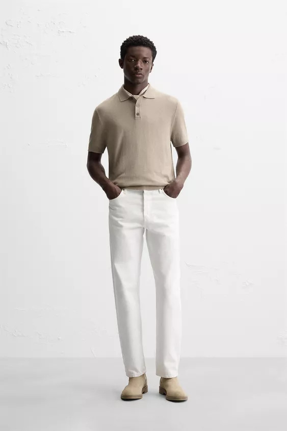 Knit polo shirt in viscose blend fabric. Lapel collar with front button closure. Short sleeves. S... | Zara US
