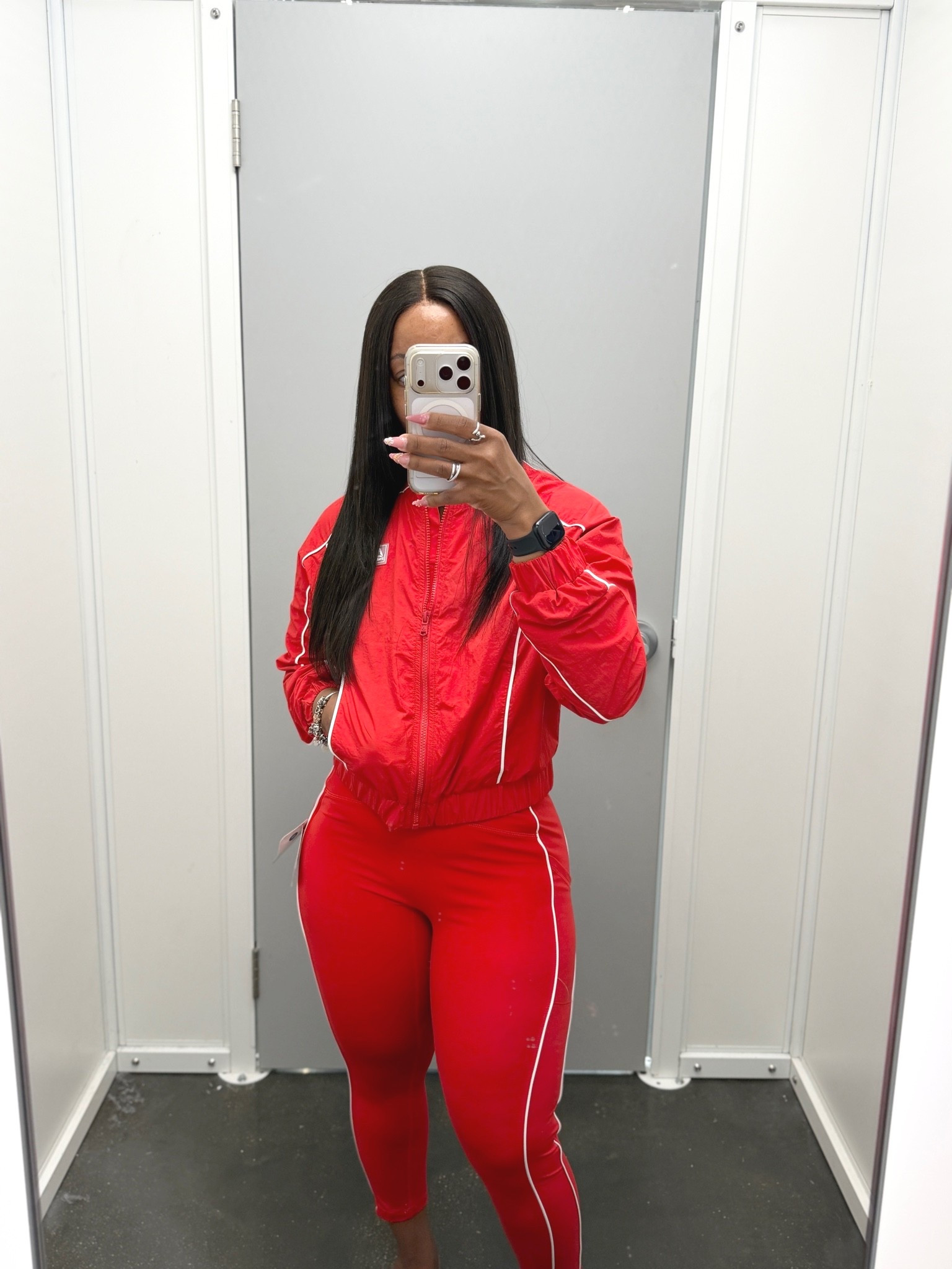 Wearing a size small in the jacket and a medium in the bottoms. 

The pants are super stretchy, so you can go down a size as I had a lot of room in the waist area.

The jacket I would prefer a medium since there is no room and no stretch. 

Love the red color

#LTKPetite #LTKActive #LTKU